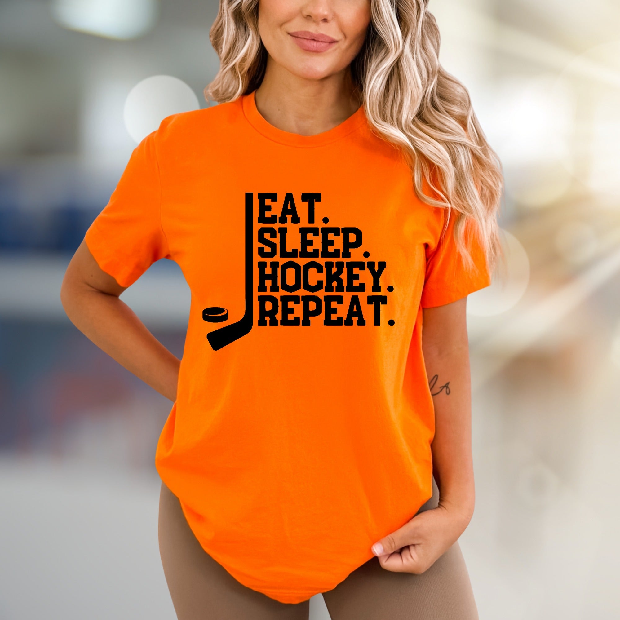 "EAT. SLEEP. HOCKEY. REPEAT." Hockey Lover Graphic Tee, a Lifestyle Pick for Sports Fans