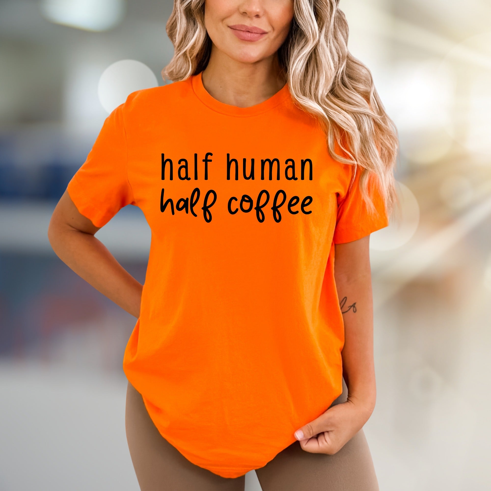 "Half Human Half Coffee" Funny Slogan Graphic Tee, a Coffee Lover's Unisex Essential