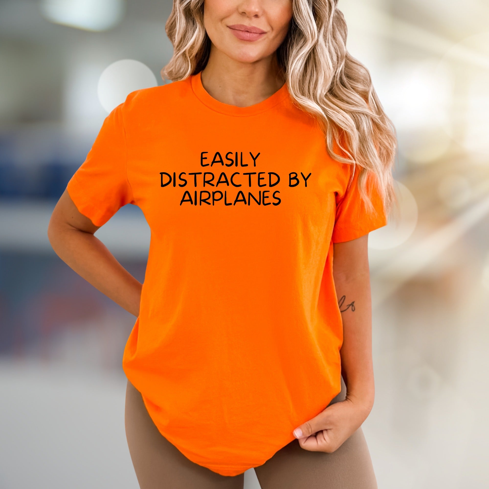 "EASILY DISTRACTED BY AIRPLANES" Flight Enthusiast Graphic Tee, a Aviation Lover's Pick for Everyday Wear