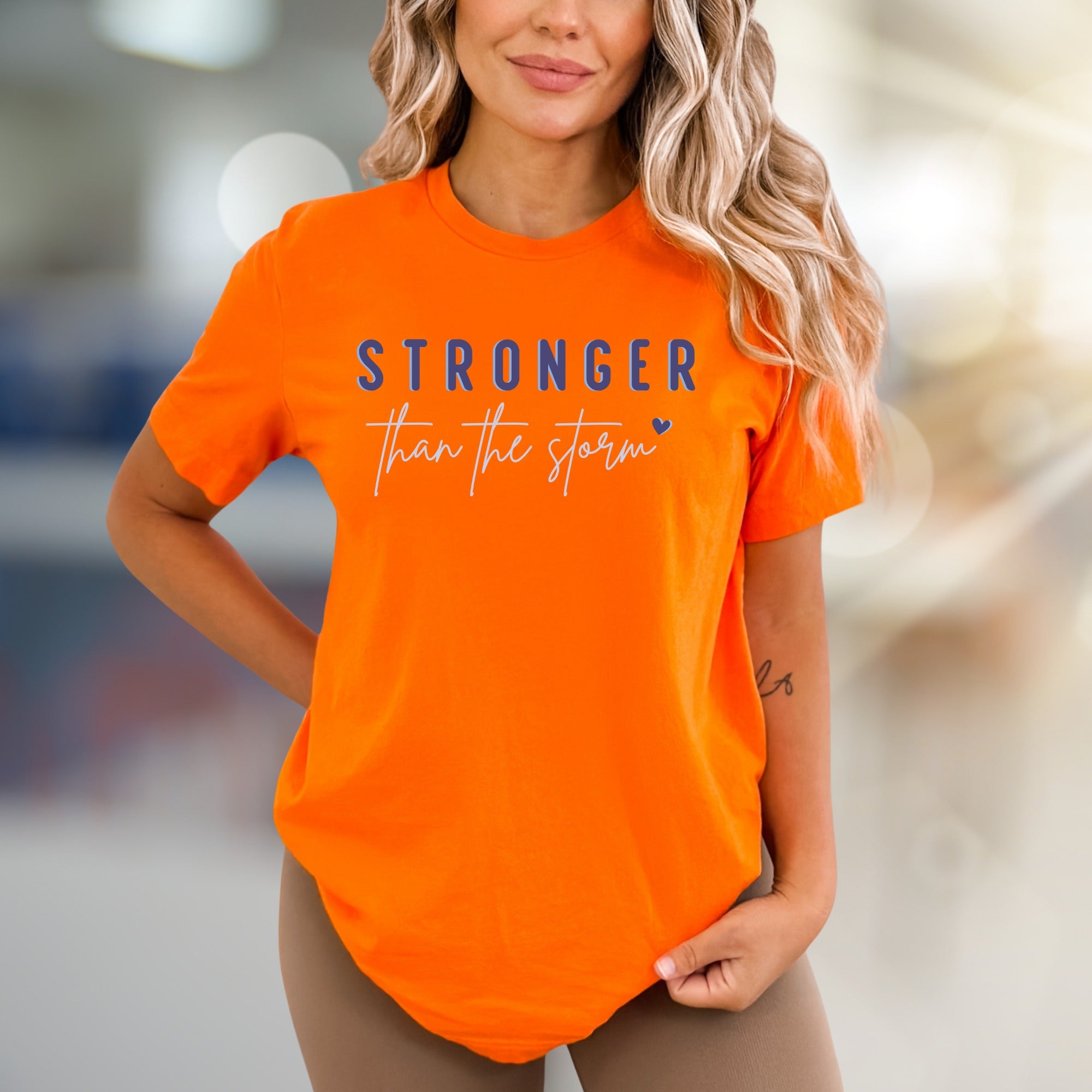 "STRONGER than the storm" Motivational Graphic Tee, an Uplifting Pick for Survivors