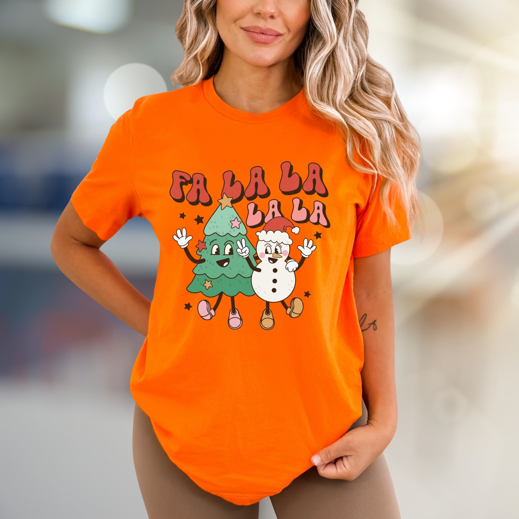"Fa La La La La" Retro Holiday Graphic Tee, a Festive Pick for Christmas Enthusiasts