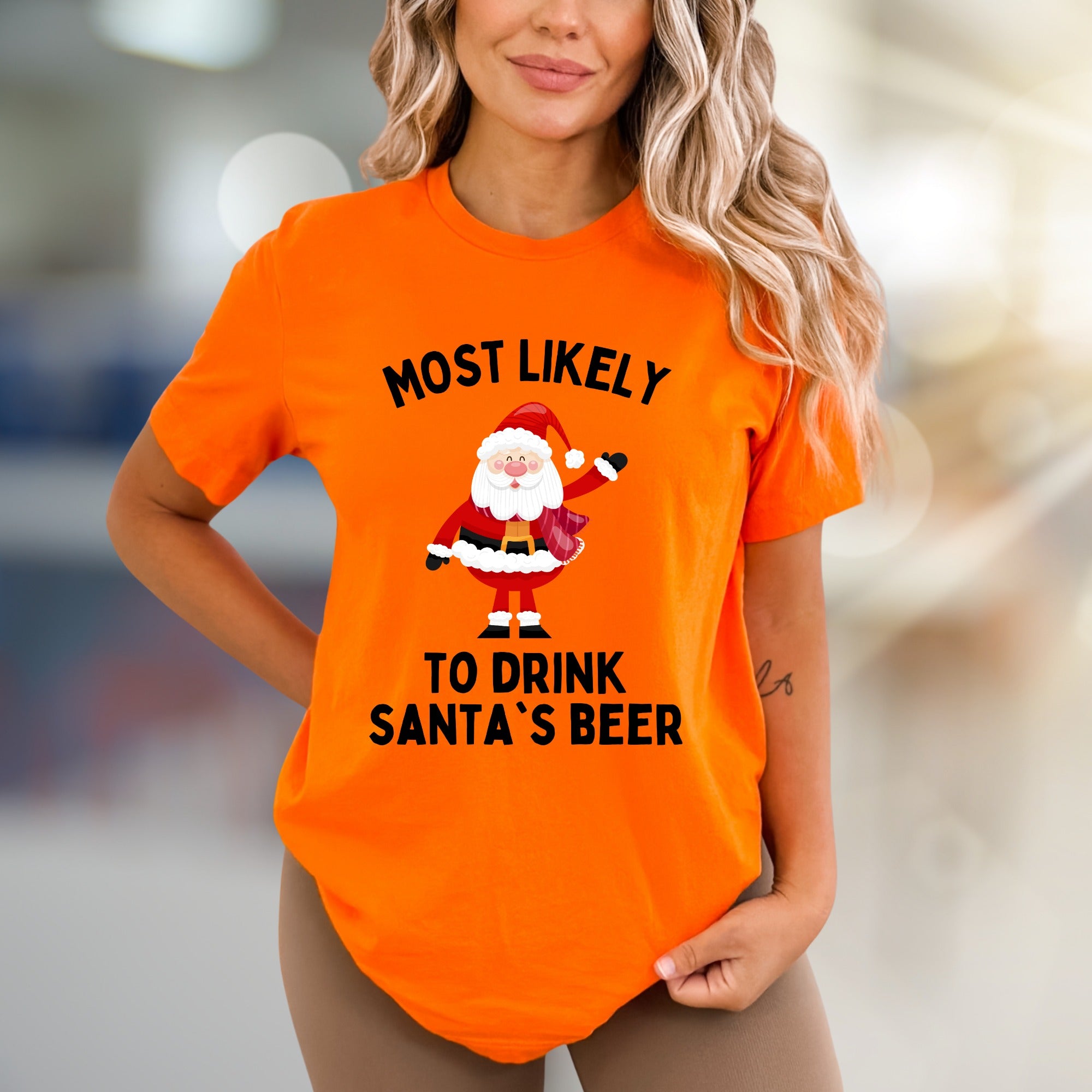 Most Likely To Drink Santa's Beer Funny Christmas Graphic Tee, a Holiday Humor Pick for Festive Adults