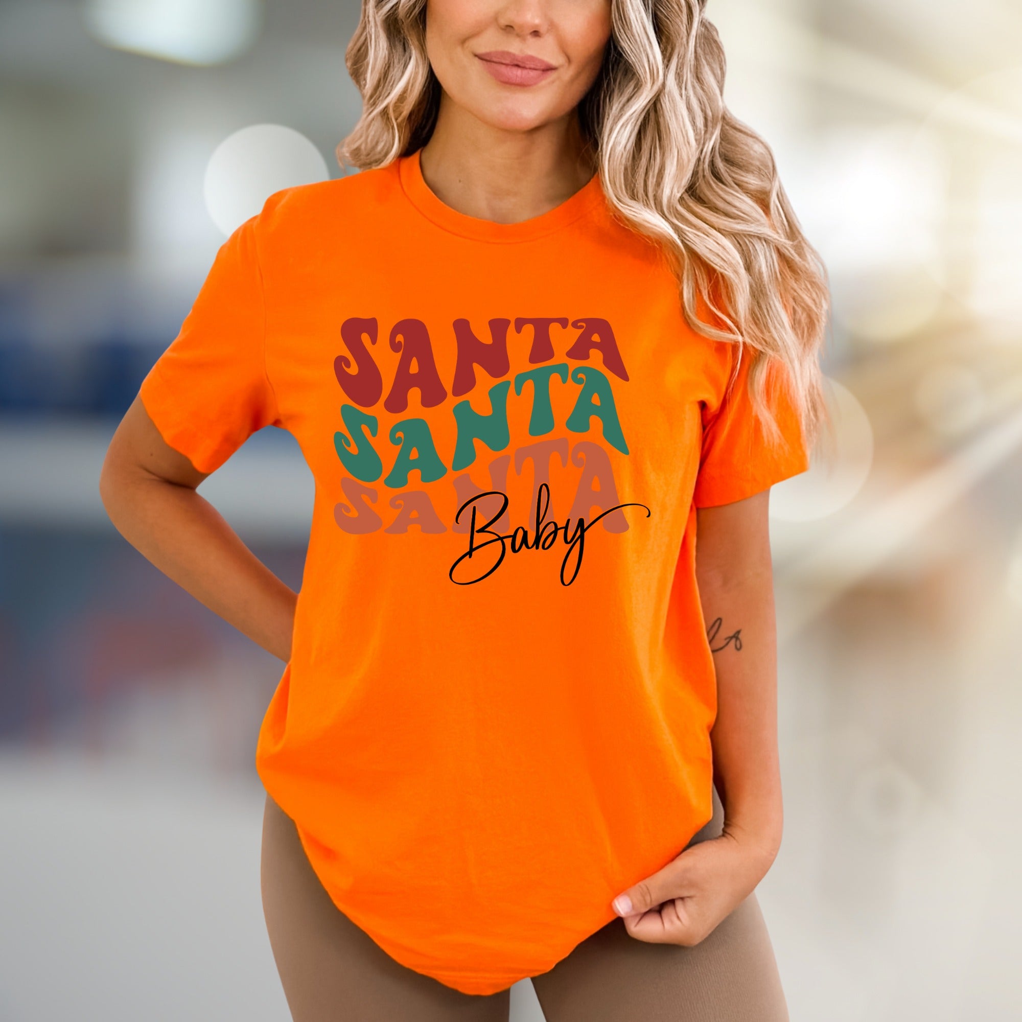 "SANTA SANTA SANTA Baby" Retro Christmas Graphic Tee, a Festive Niche for Holiday Enthusiasts