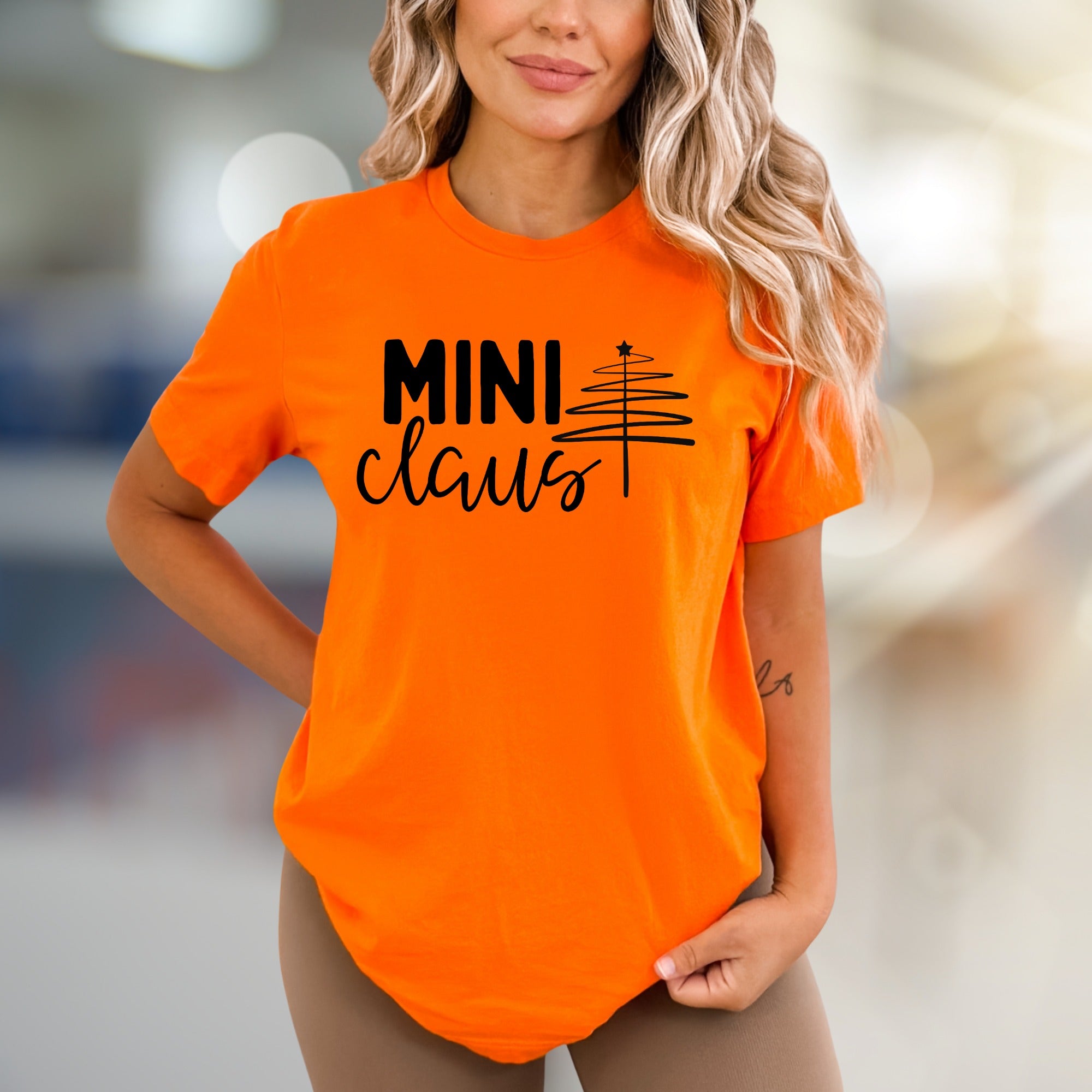 "MINI Claus" Whimsical Christmas Tree Graphic Tee, a Festive Pick for Holiday Enthusiasts