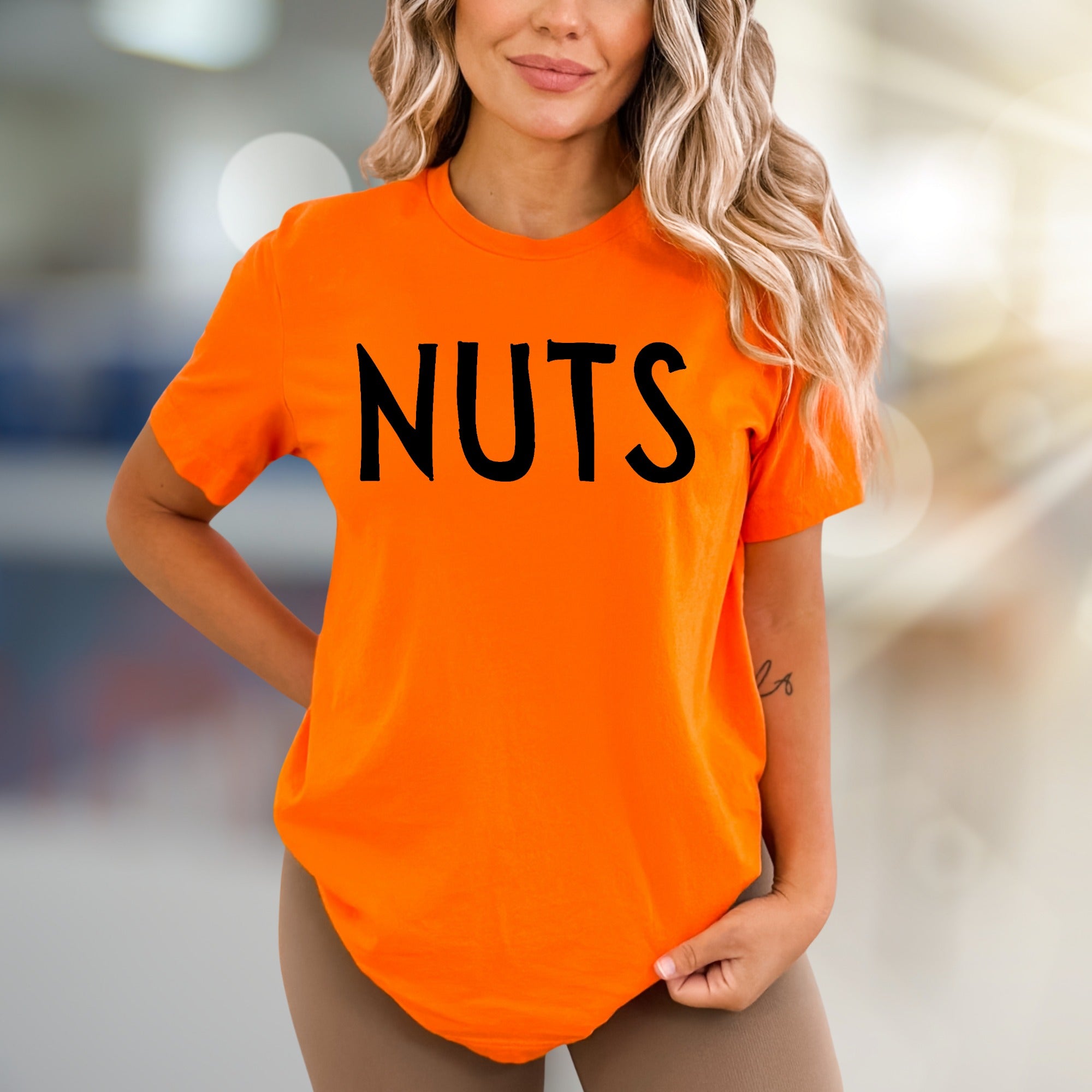 "NUTS" Humorous Graphic Tee, a Bold Statement for Playful Personalities
