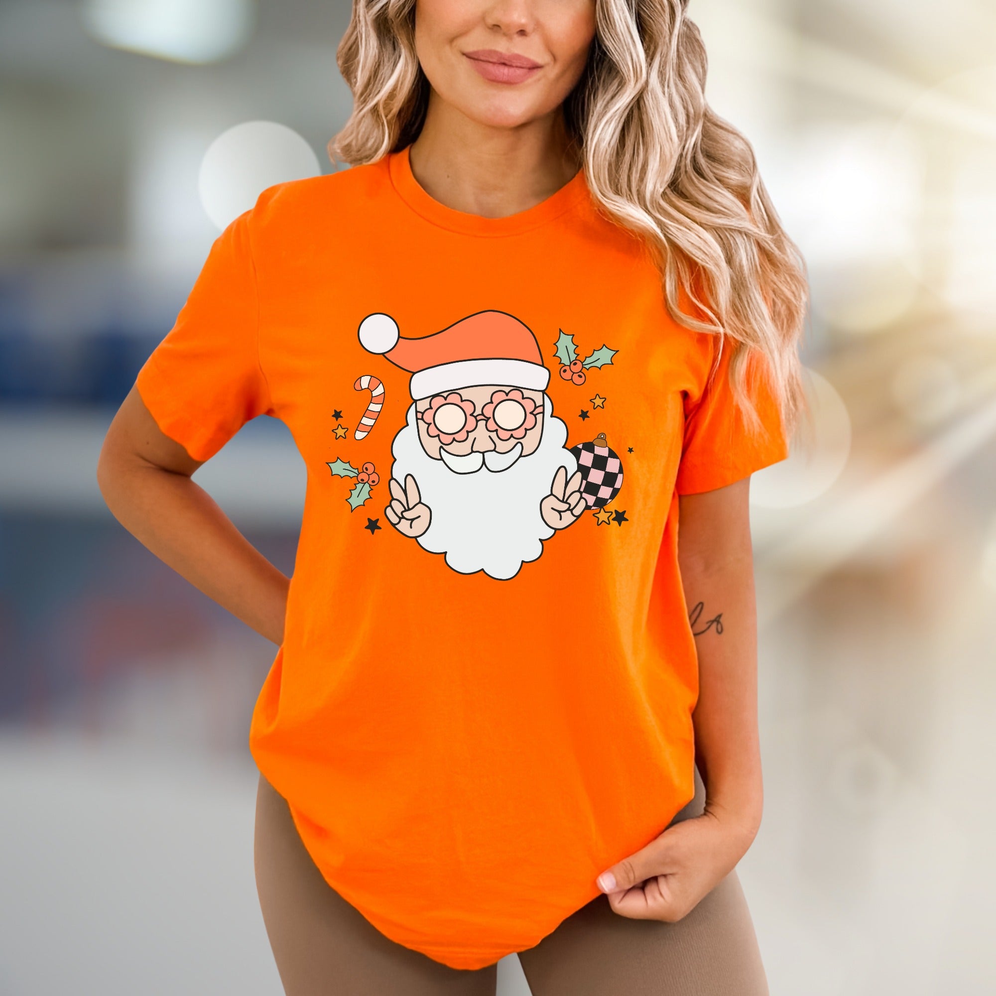 Groovy Santa Peace Sign Christmas Graphic Tee, a Retro Holiday Pick for Everyone