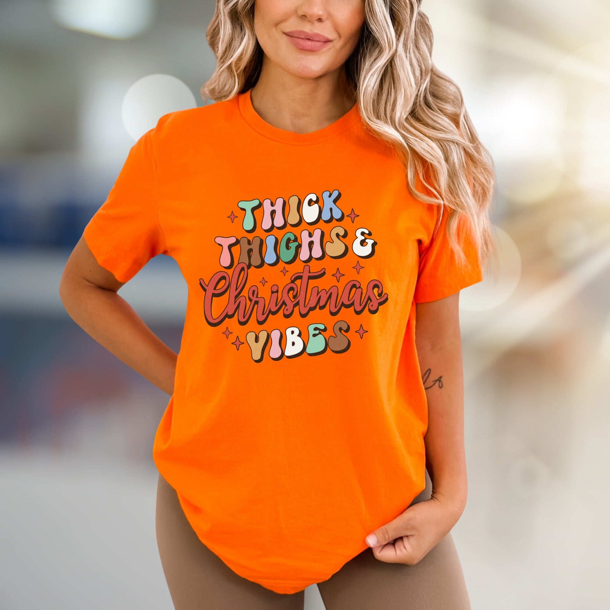 "Thick Thighs & Christmas Vibes" Retro Graphic Tee, a Festive Niche for Holiday Enthusiasts