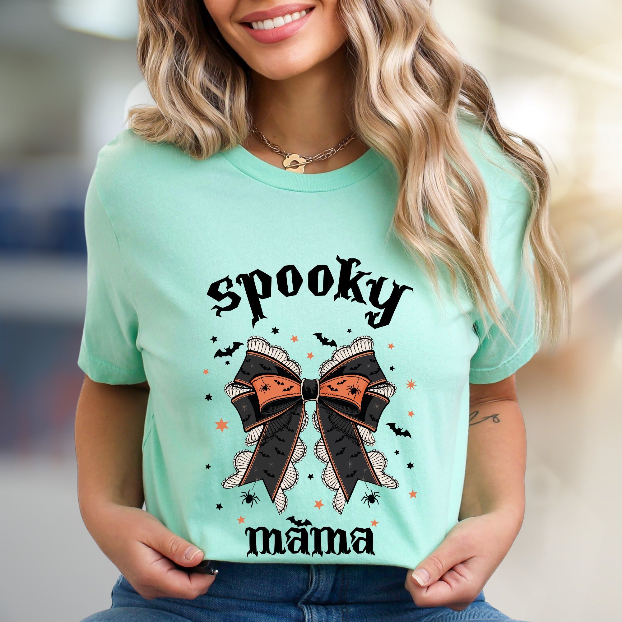 "Spooky Mama" Halloween Bow Graphic Tee, a Gothic-Chic Pick for Moms