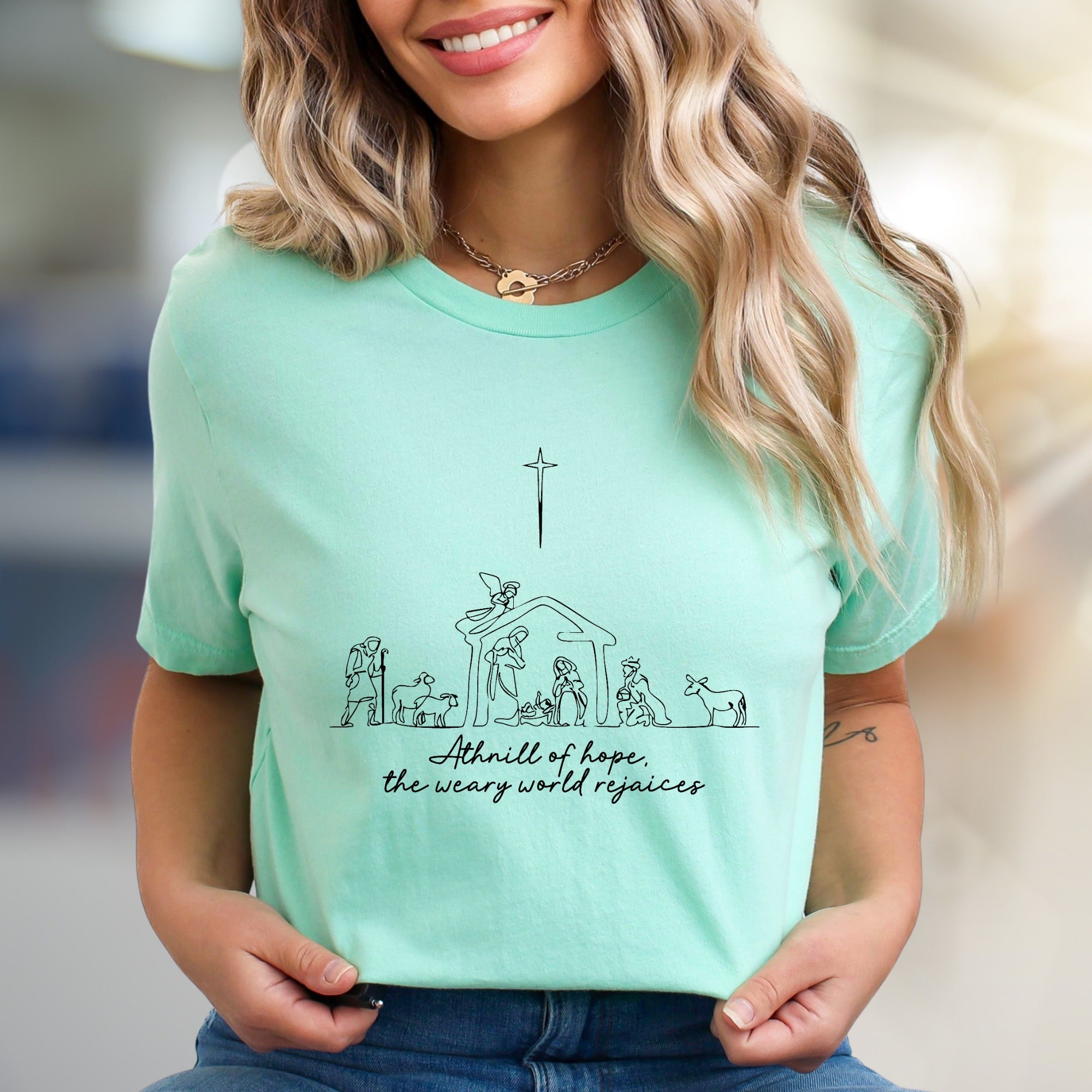 "A thrill of hope, the weary world rejoices" Nativity Scene Graphic Tee, a Holiday Pick for Believers