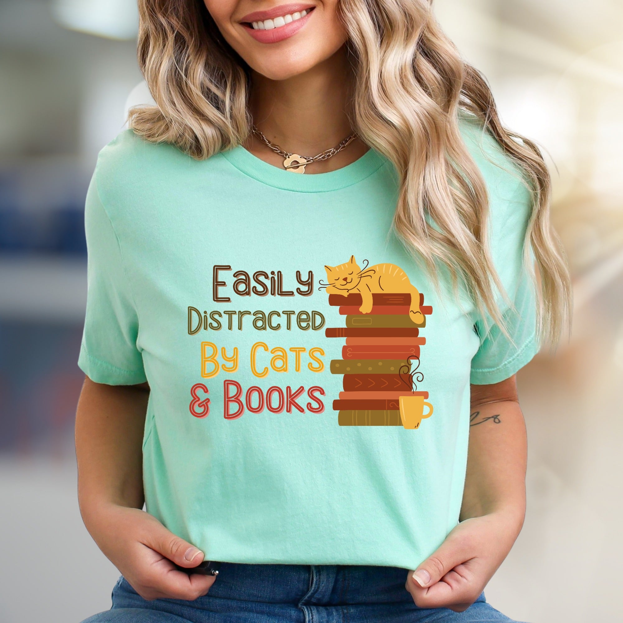 "Easily Distracted By Cats & Books" Cozy Reader Graphic Tee, a Feline Fan Pick for Book Lovers