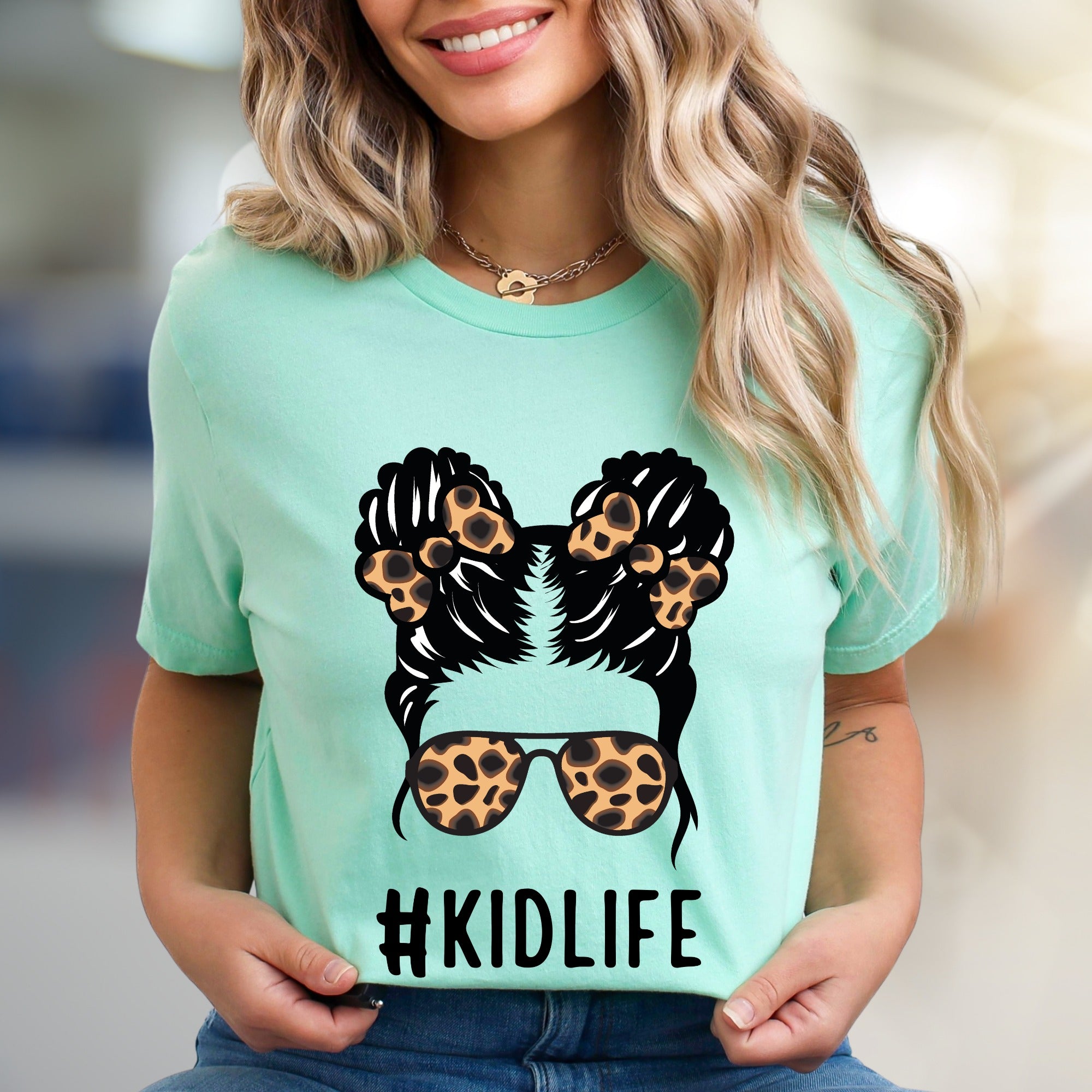 #KIDLIFE Messy Hair Bun Leopard Sunglasses Graphic Tee, a Mom Life Pick for Parents