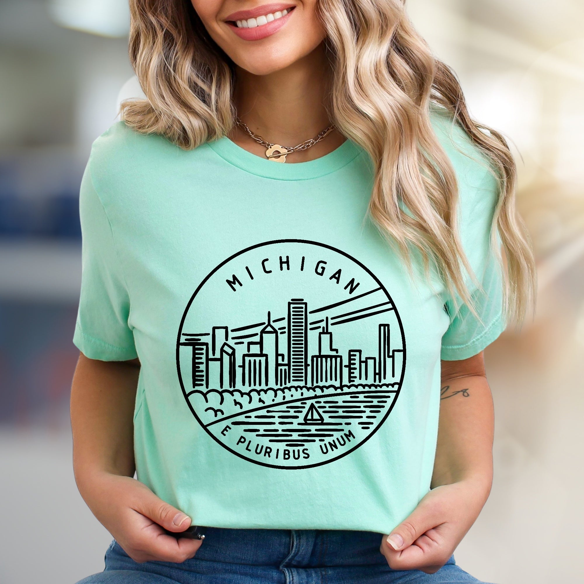 "MICHIGAN E PLURIBUS UNUM" Cityscape Graphic Tee, a State Pride Pick for Travel Enthusiasts