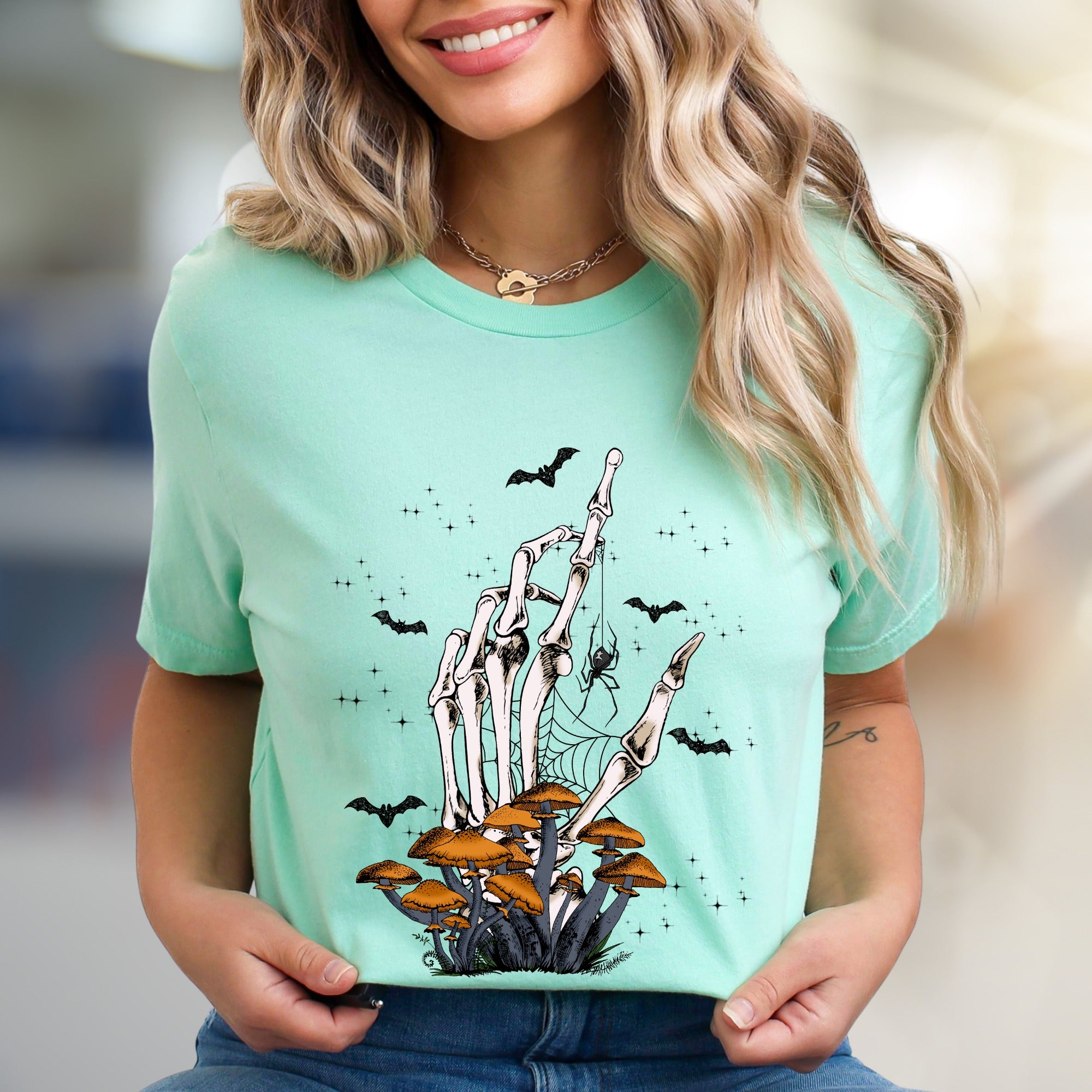 Skeleton Hand Mushroom Graphic Tee, a Spooky-Cute Pick for Halloween Lovers