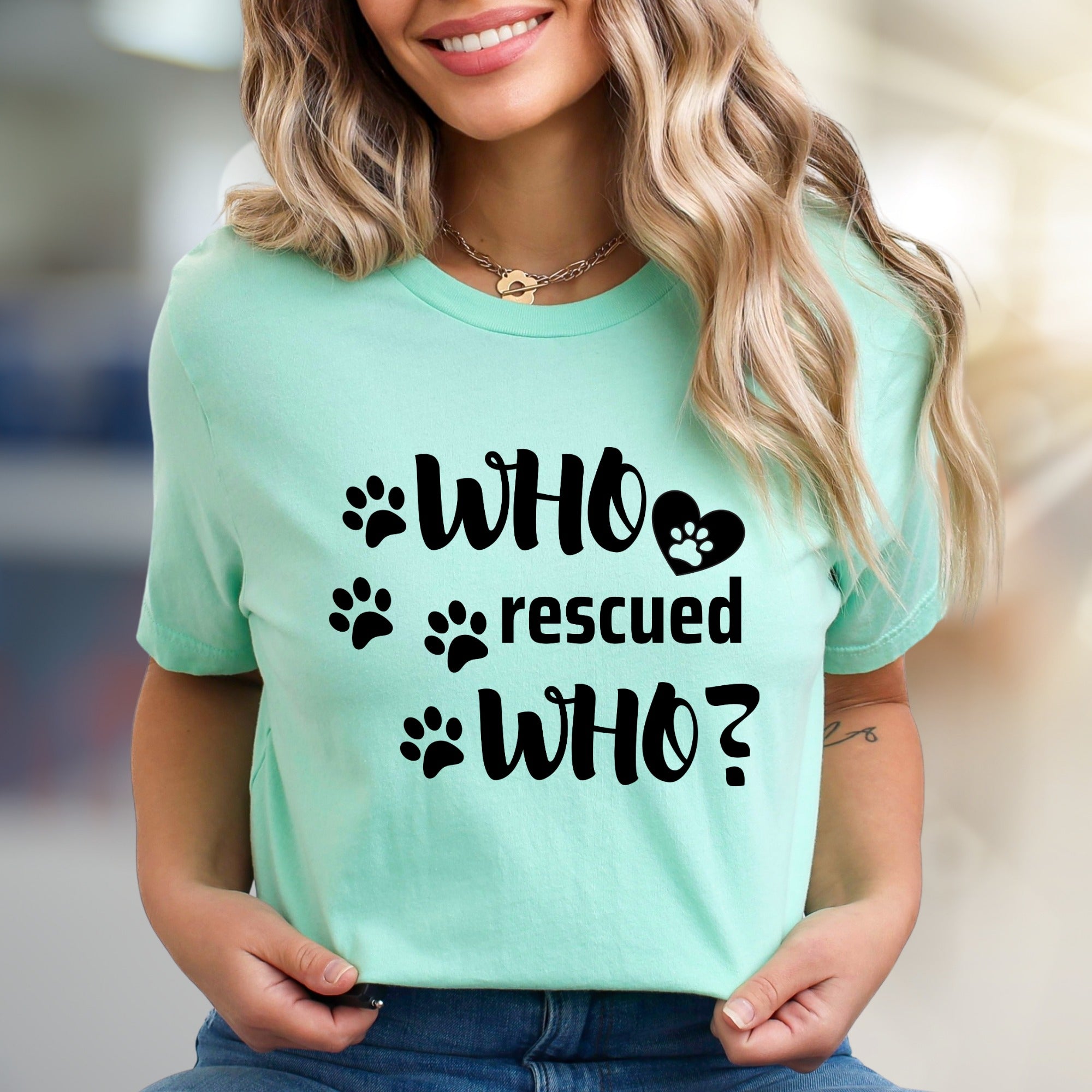 "WHO rescued WHO?" Paw Print Graphic Tee, a Heartfelt Pick for Pet Lovers