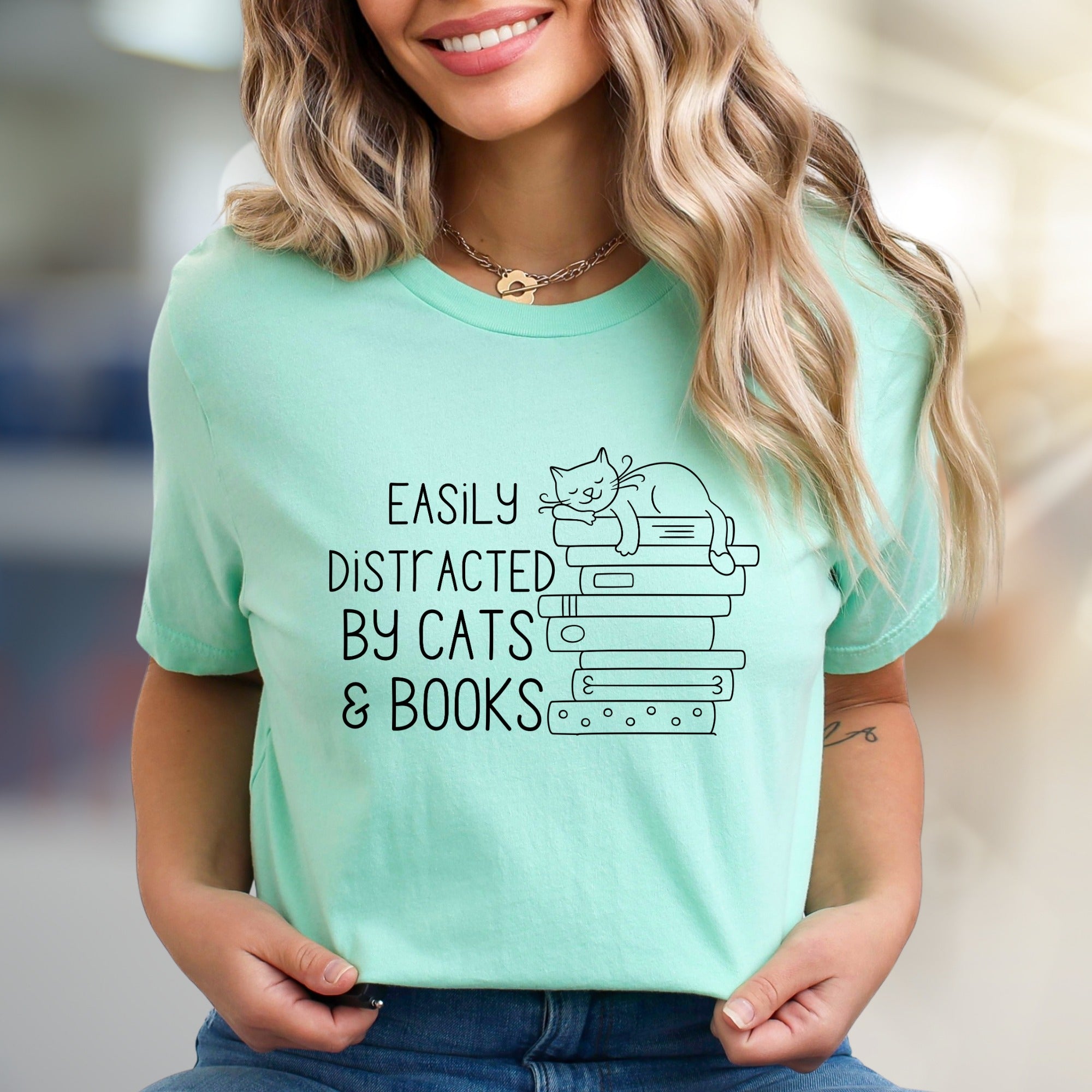 "Easily Distracted By Cats & Books" Cozy Graphic Tee, a Feline Lover's Pick for Bookworms