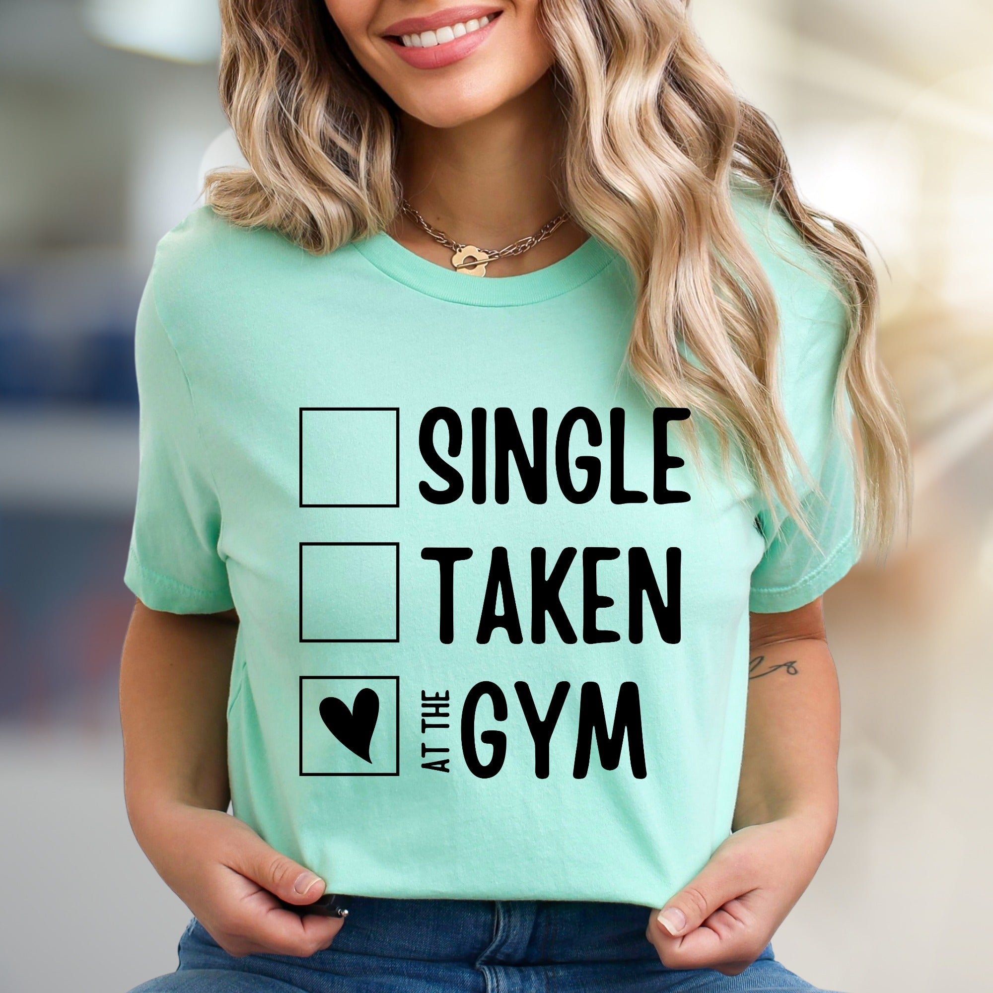"Single, Taken, At The Gym" Workout Graphic Tee, a Fitness Humor Pick for Gym Lovers