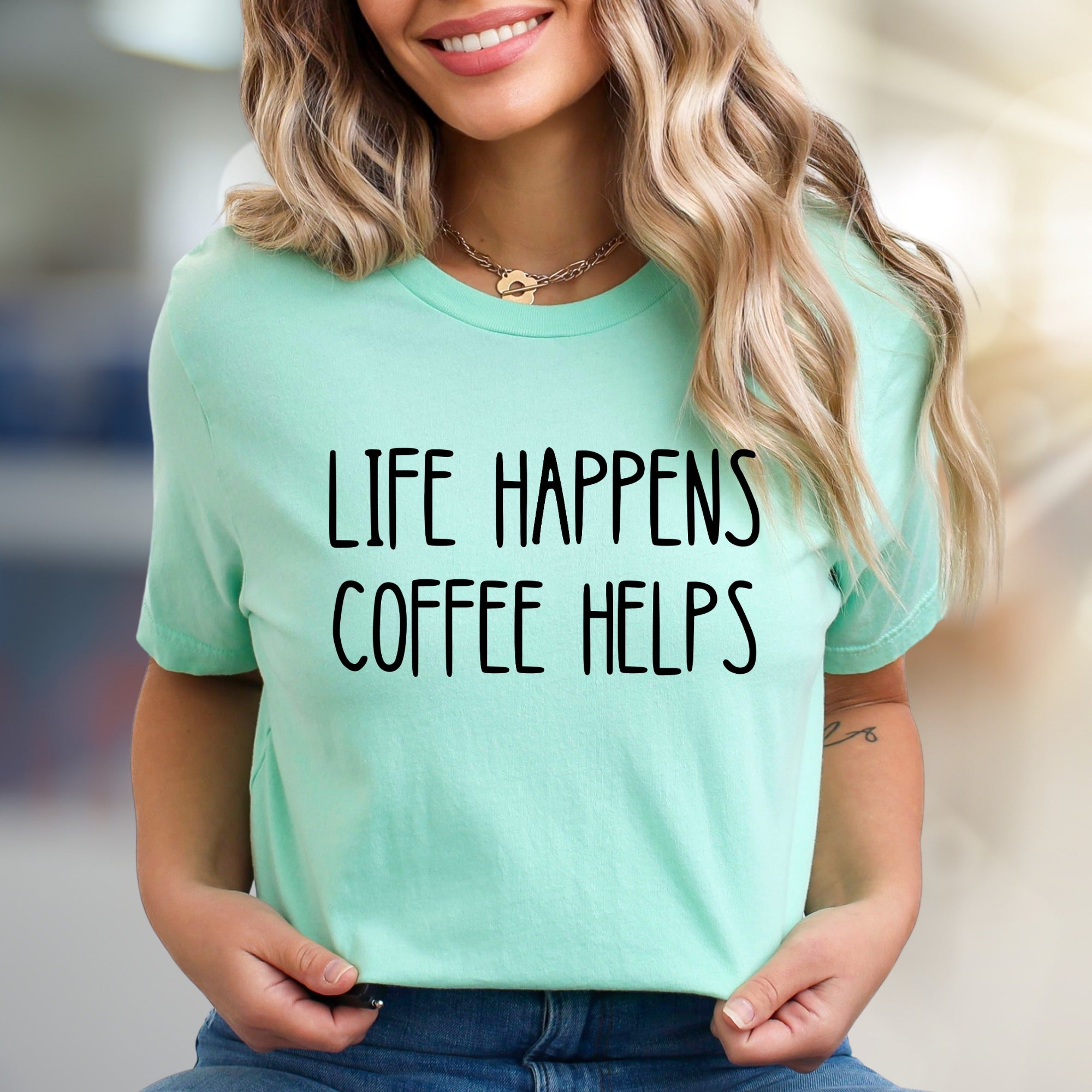 "LIFE HAPPENS COFFEE HELPS" Coffee Lover Graphic Tee, a Humorous Pick for Everyday Wear