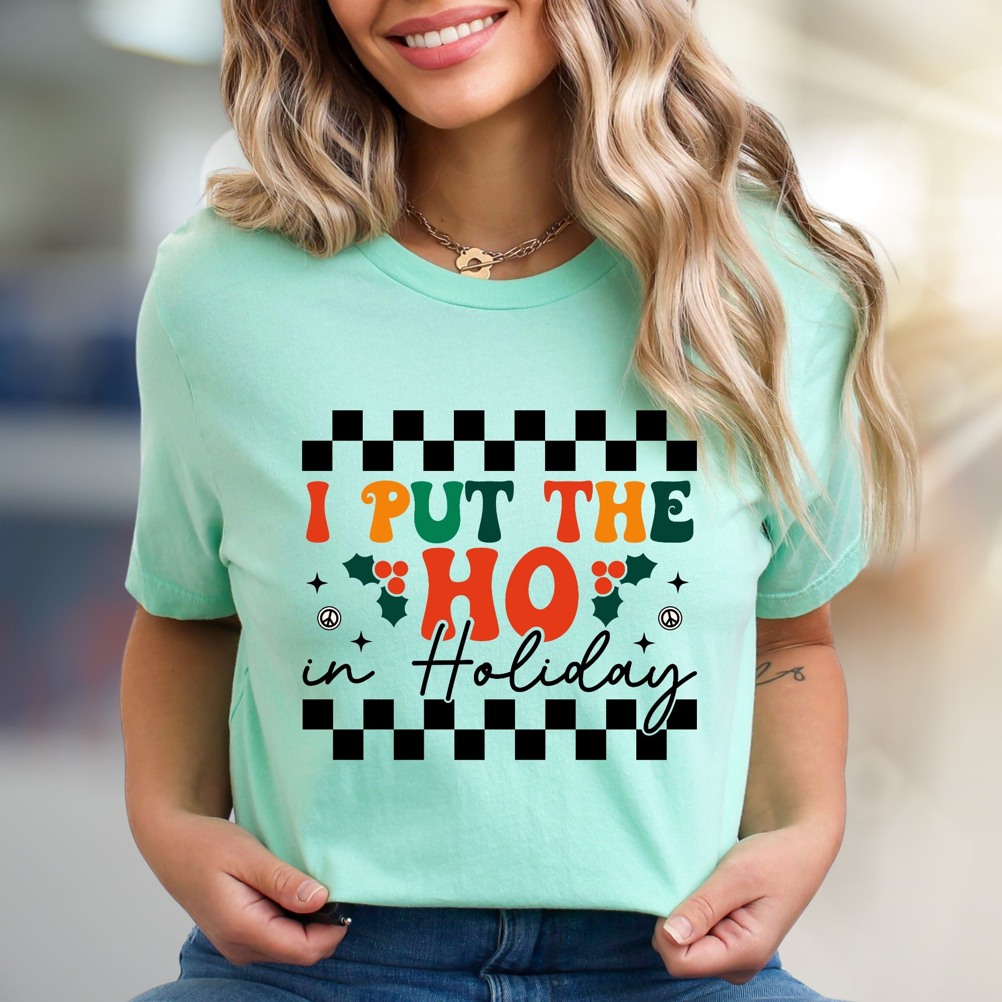 "I Put The HO In Holiday" Retro Checkered Graphic Tee, a Festive Niche for Holiday Enthusiasts
