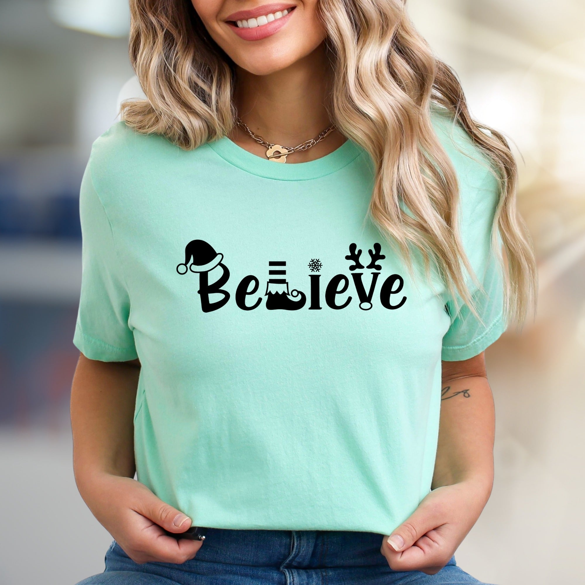 "Believe" Christmas Graphic Tee, a Festive Holiday Pick for Enthusiasts