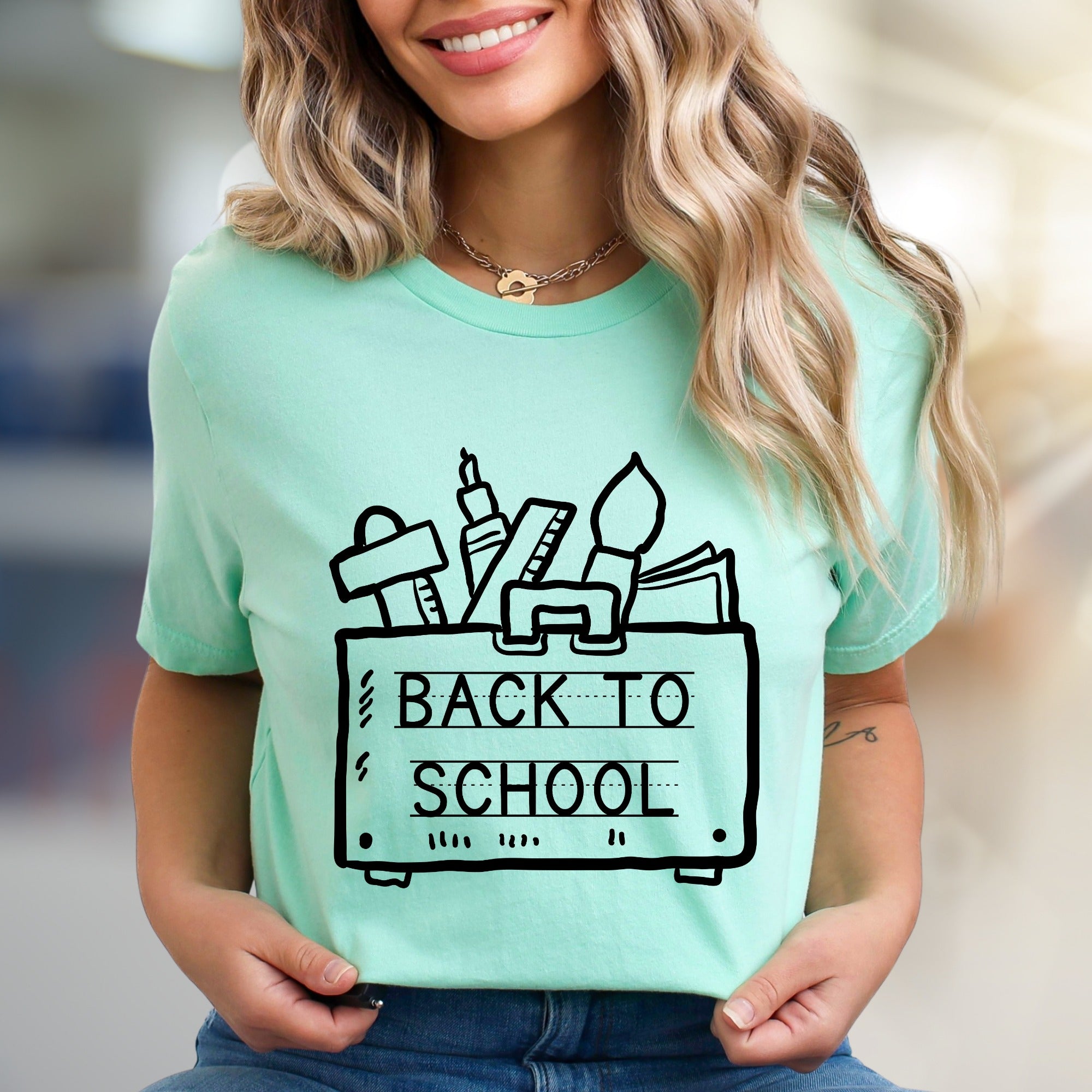 "Back to School" School Supply Graphic Tee, a Nostalgic Pick for Educators
