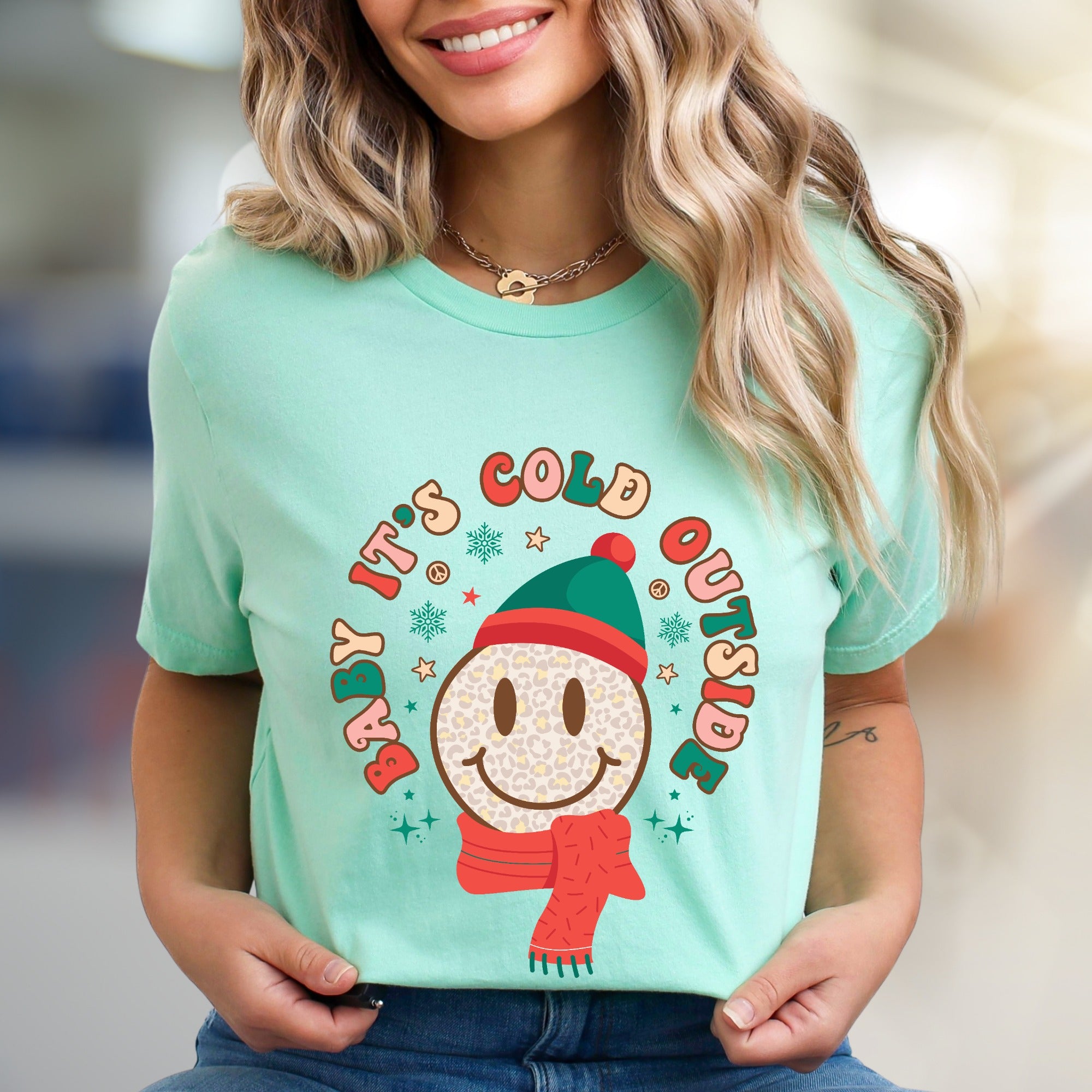 "Baby It's Cold Outside" Winter Smiley Graphic Tee, a Festive Comfort Pick for Holiday Lovers