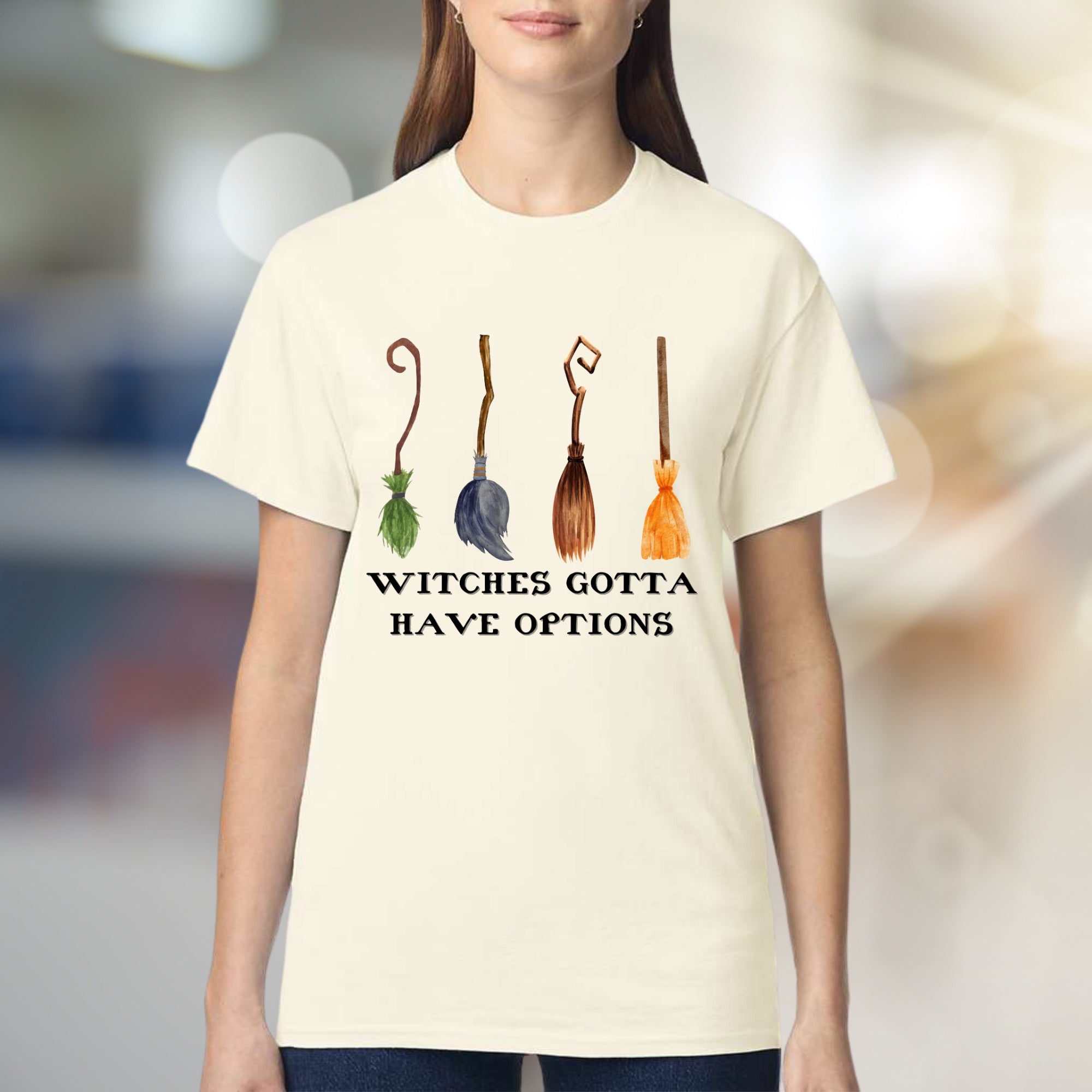 "Witches Gotta Have Options" Halloween Broomstick Graphic Unisex Tee, a Witchy Pick for Spooky Season Enthusiasts