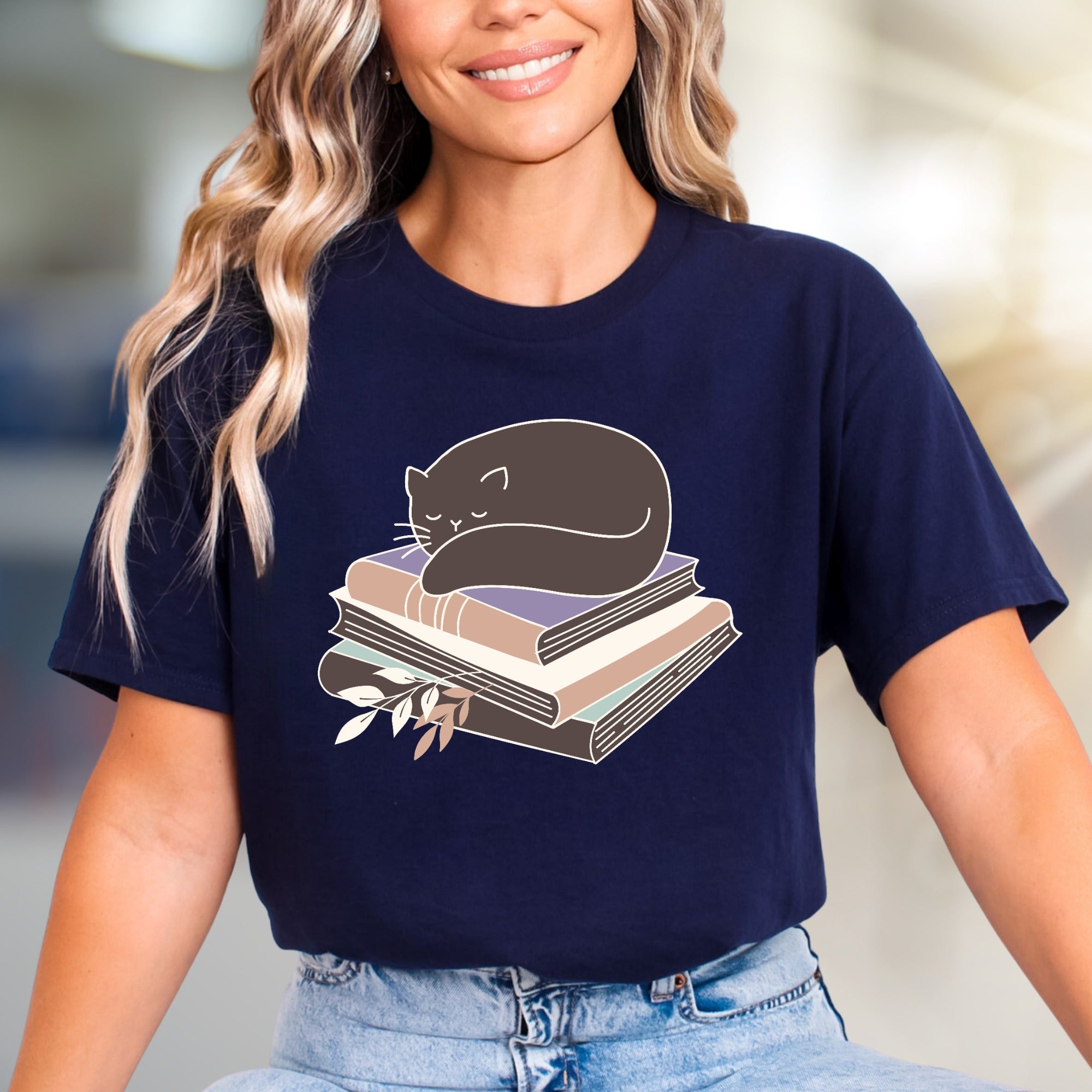 Sleeping Cat on Books Graphic Tee, a Cozy Literary Pick for Book Lovers