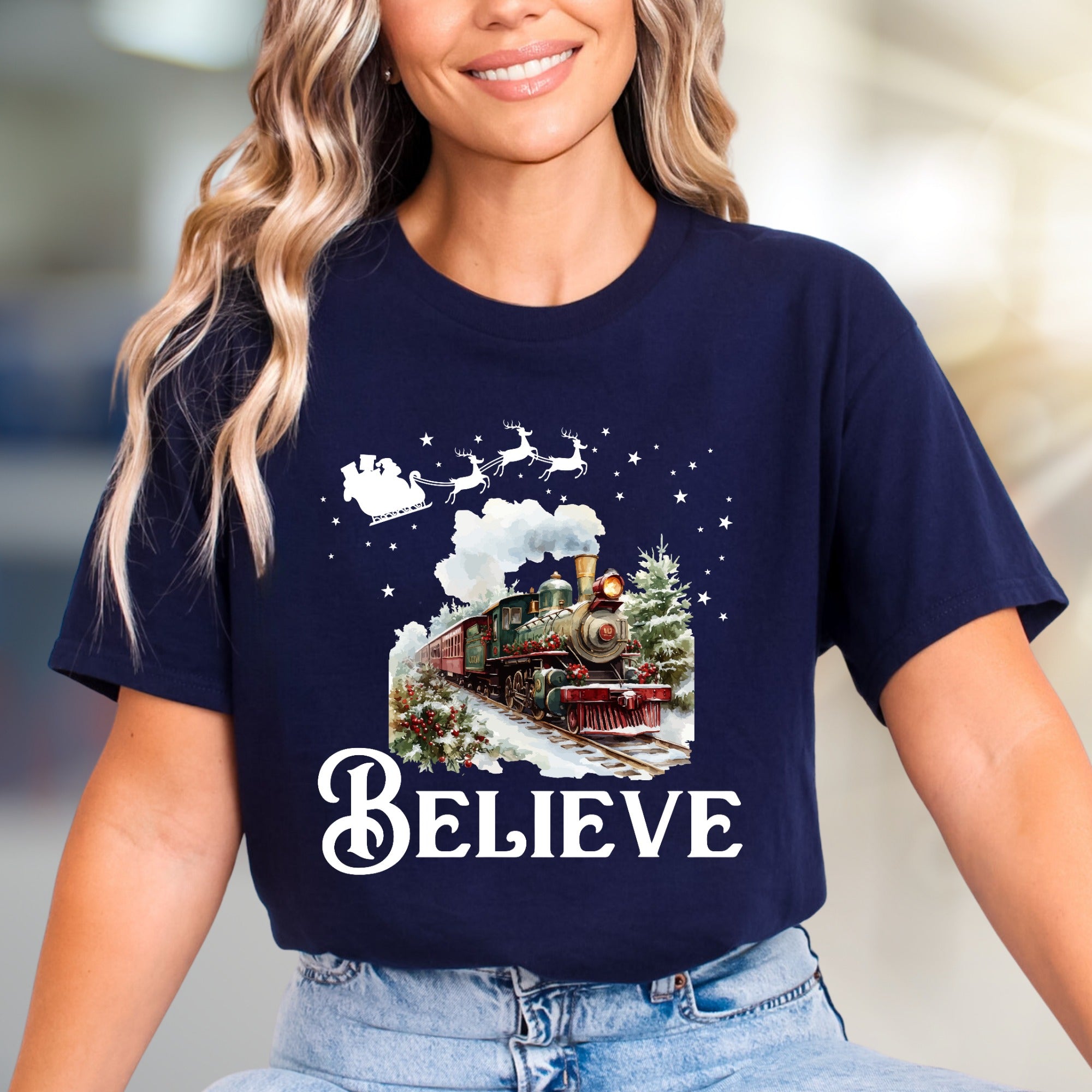 "BELIEVE" Christmas Train Graphic Tee, a Winter Wonderland Pick for Holiday Enthusiasts