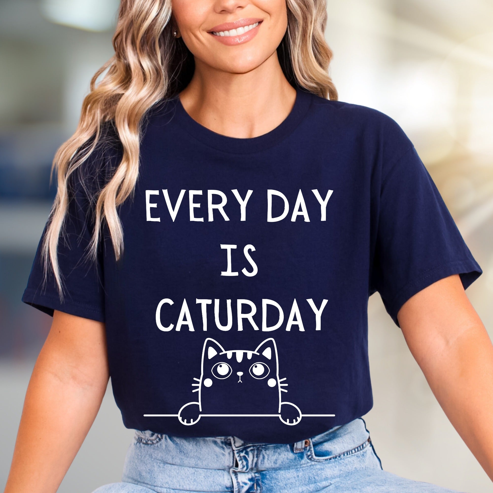 "EVERY DAY IS CATURDAY" Whimsical Cat Graphic Tee, a Feline Fun Pick for Pet Lovers
