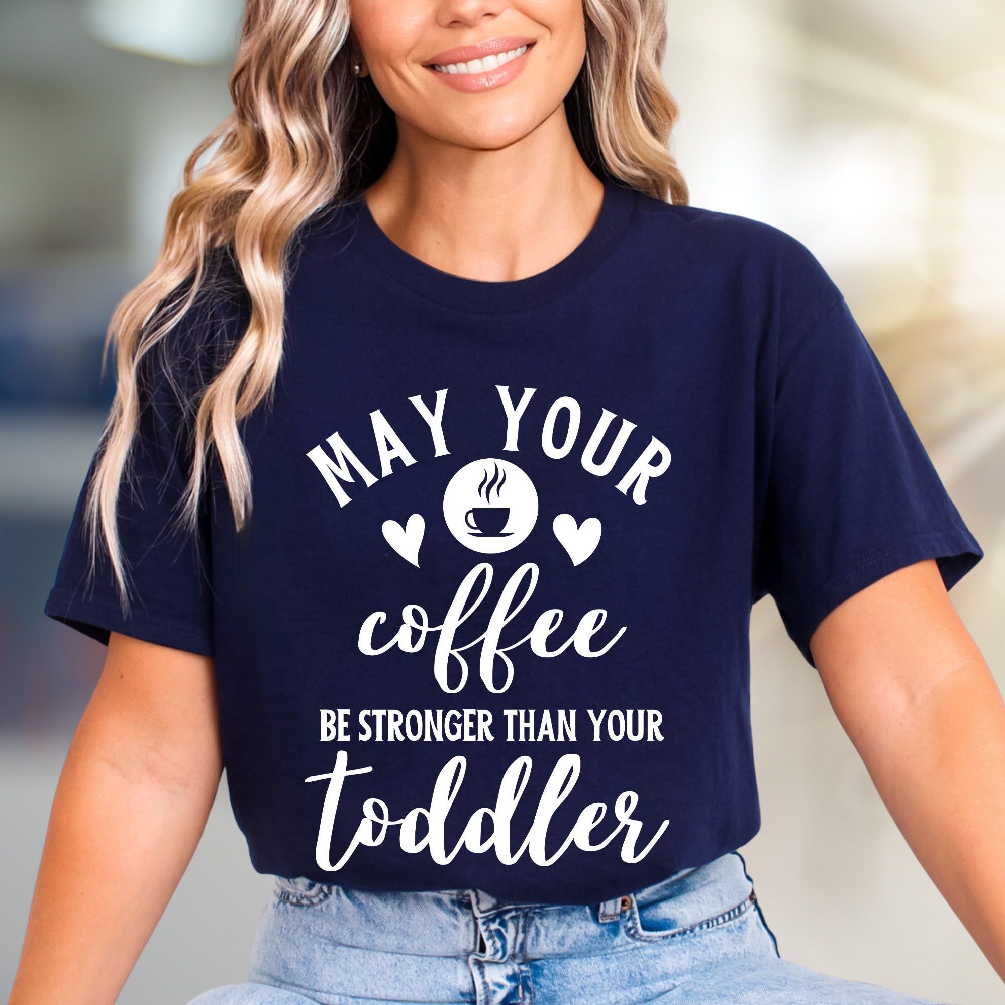 "May Your Coffee Be Stronger Than Your Toddler" Graphic Tee, a Parent Humor Pick for Coffee Lovers