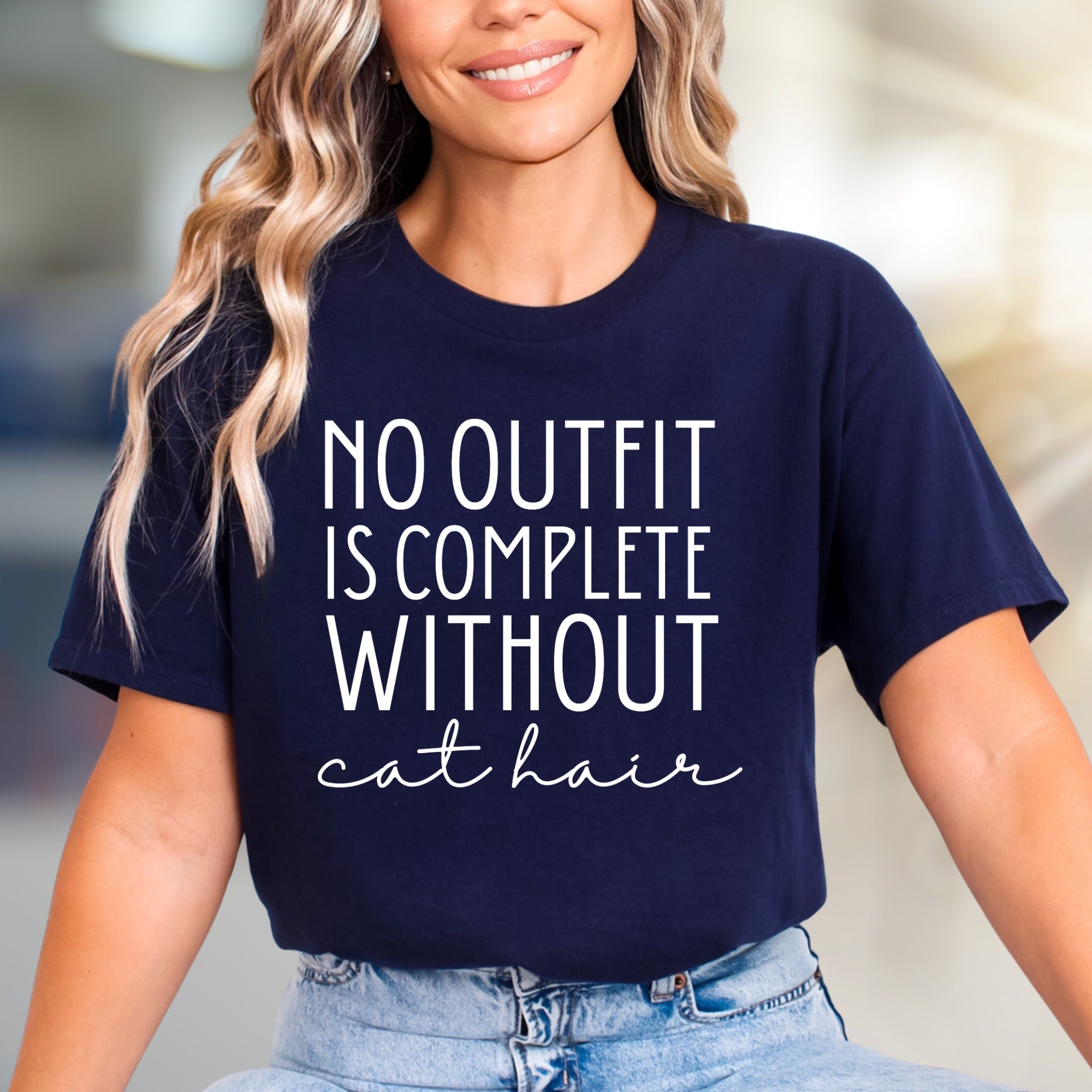 "NO OUTFIT IS COMPLETE WITHOUT cat hair" Humorous Cat Lover Graphic Tee, a Witty Lifestyle Pick for Pet Owners