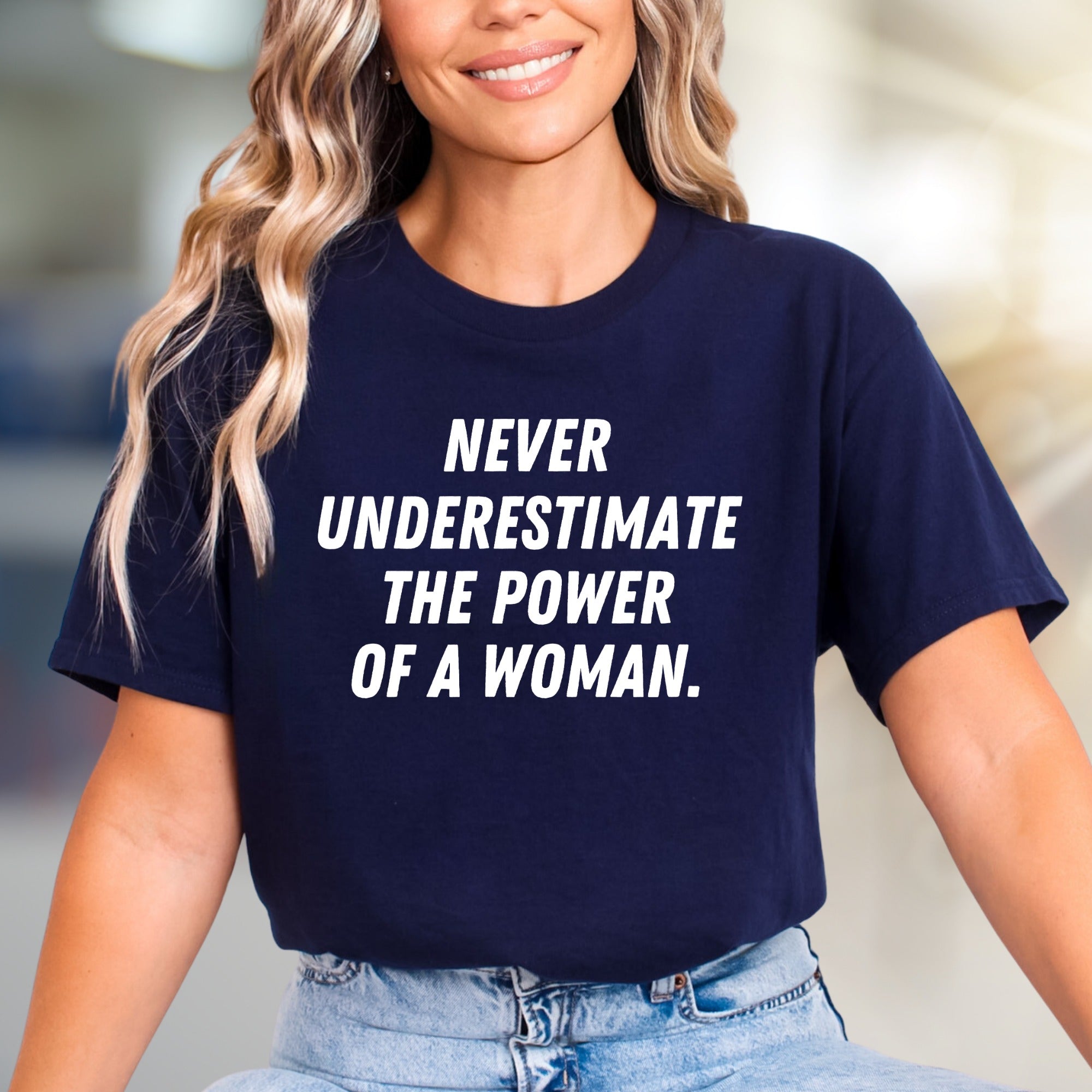 "NEVER UNDERESTIMATE THE POWER OF A WOMAN." Empowering Graphic Tee, a Bold Statement for Her