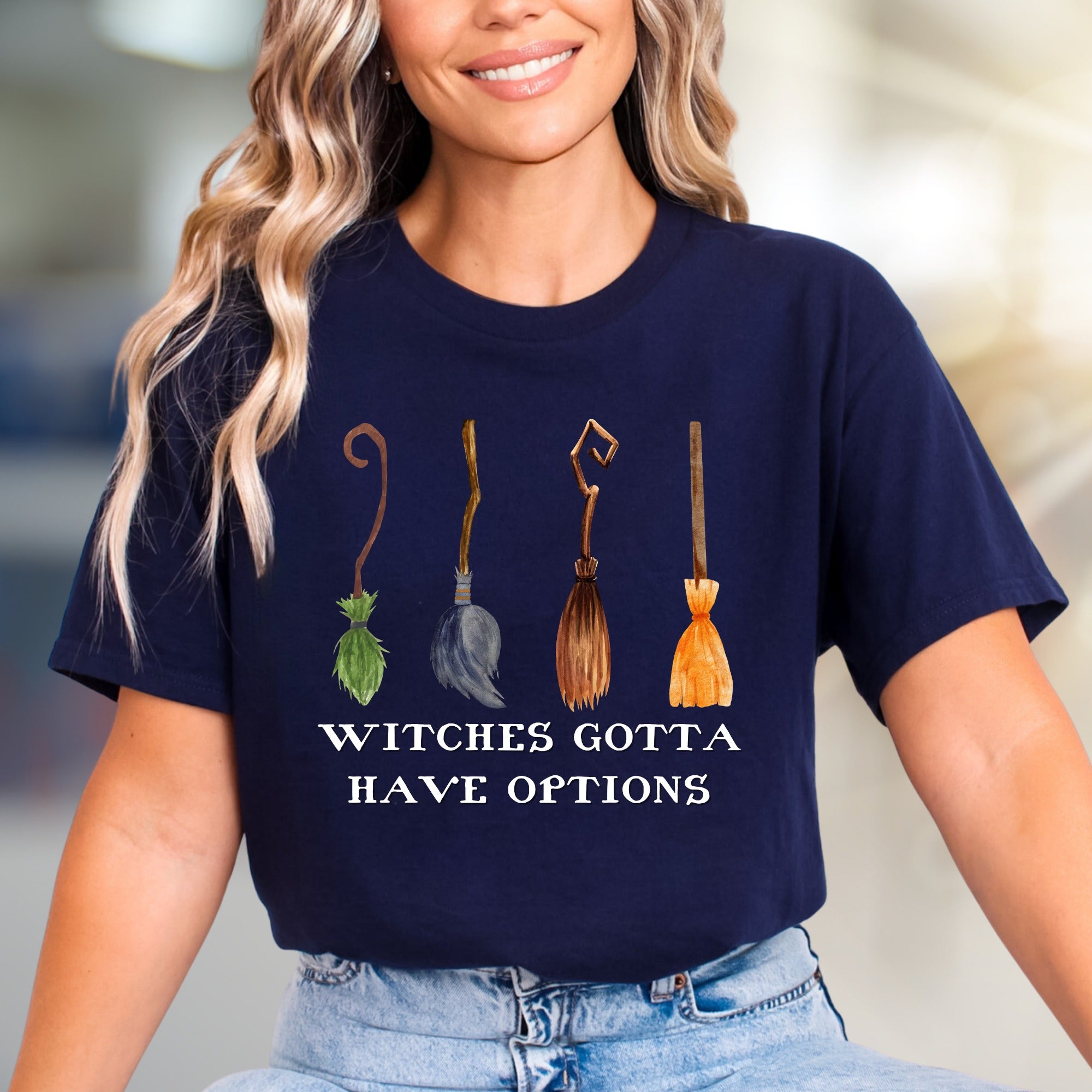 "Witches Gotta Have Options" Halloween Broomstick Graphic Unisex Tee, a Witchy Pick for Spooky Season Enthusiasts