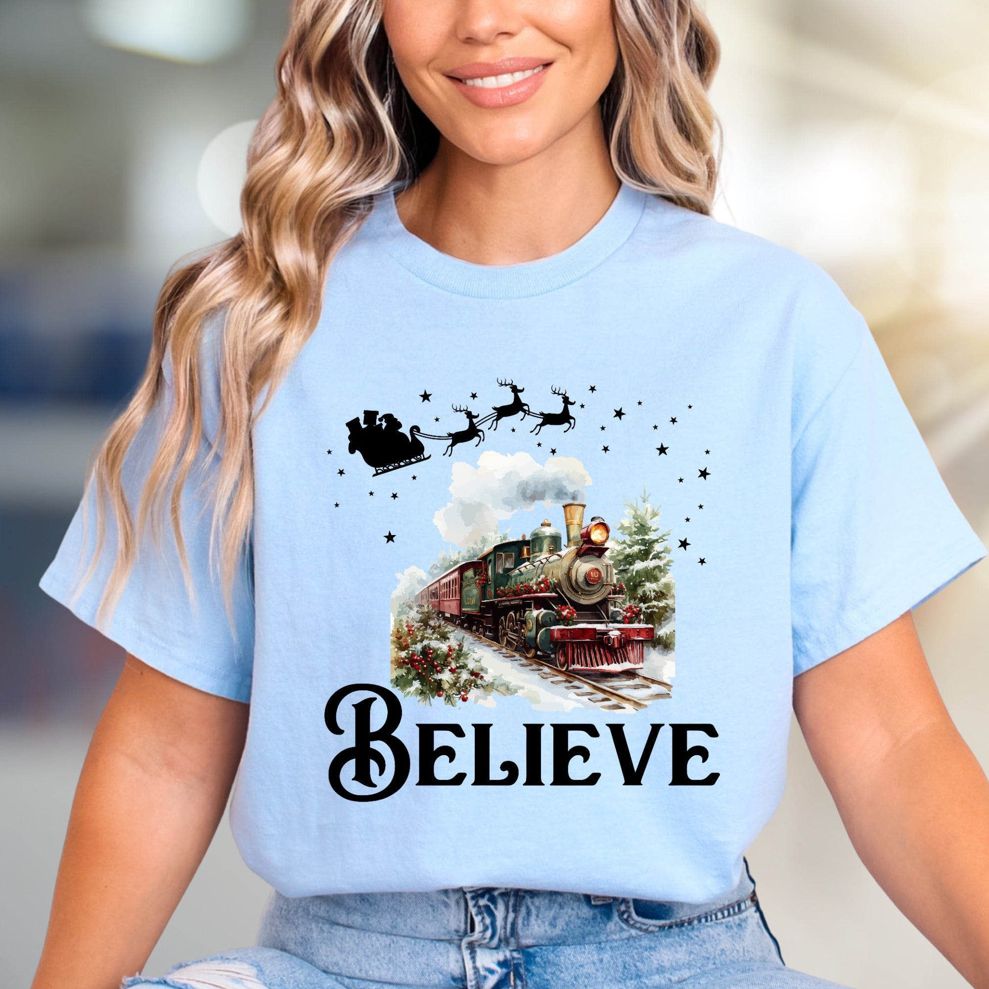 "BELIEVE" Christmas Train Graphic Tee, a Winter Wonderland Pick for Holiday Enthusiasts