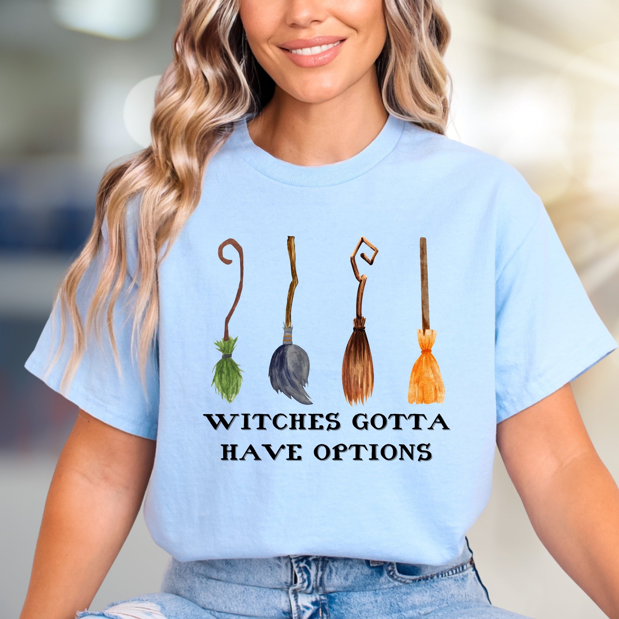 "Witches Gotta Have Options" Halloween Broomstick Graphic Tee, a Whimsical Pick for Halloween Enthusiasts