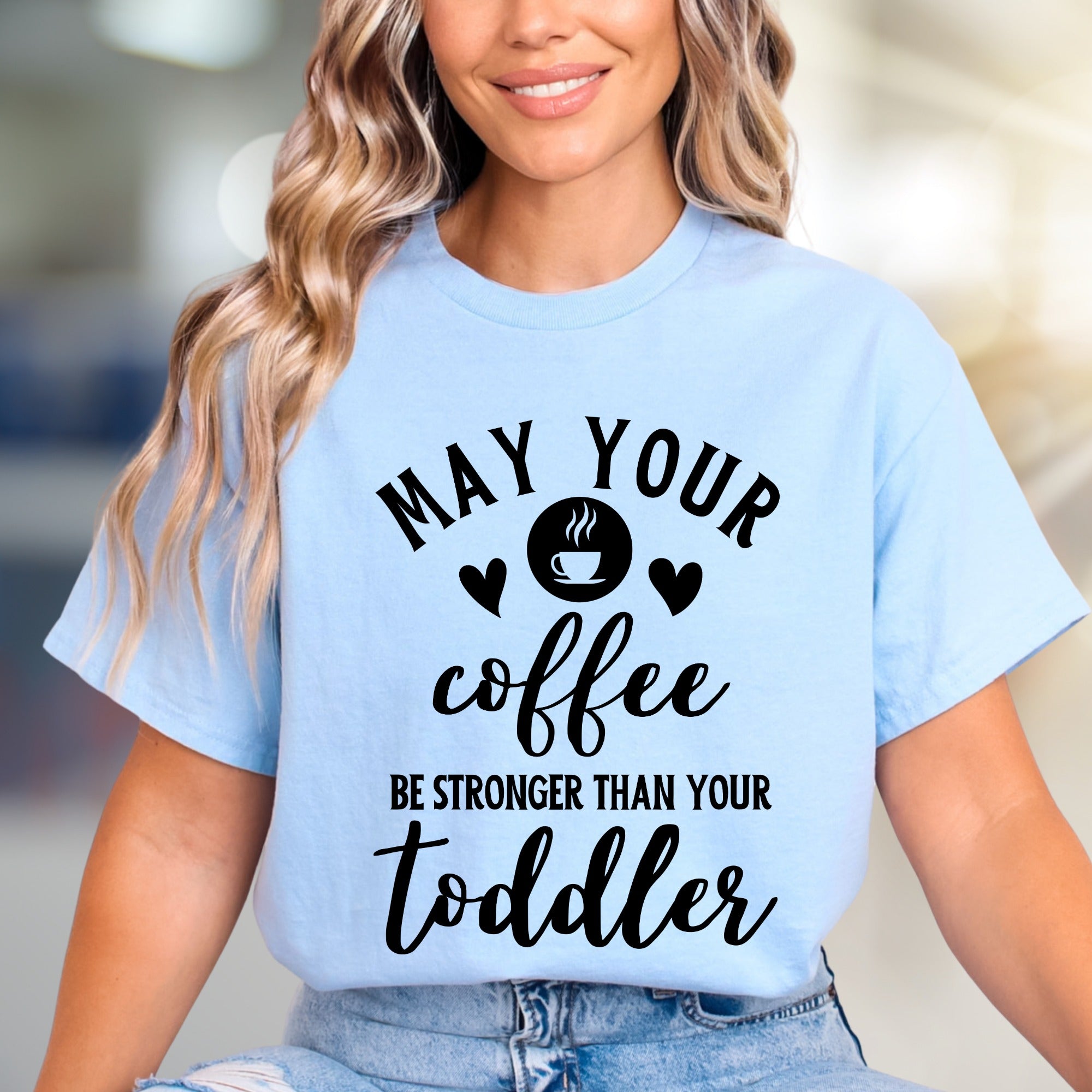 "May Your Coffee Be Stronger Than Your Toddler" Graphic Tee, a Parent Humor Pick for Coffee Lovers