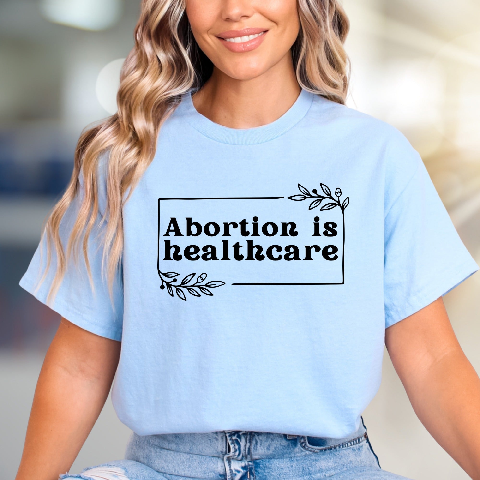 "Abortion is Healthcare" Botanical Frame Graphic Tee, a Statement Unisex Tee for Advocates