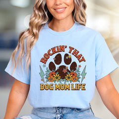 "ROCKIN' THAT DOG MOM LIFE" Retro Paw Print Graphic Tee, a Boho Chic Pick for Dog Lovers