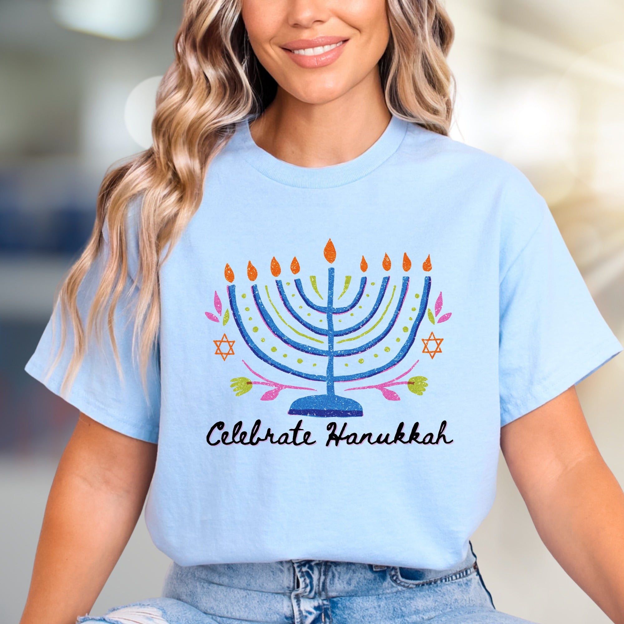"Celebrate Hanukkah" Vibrant Menorah Graphic Tee, a Festive Holiday Pick for Enthusiasts