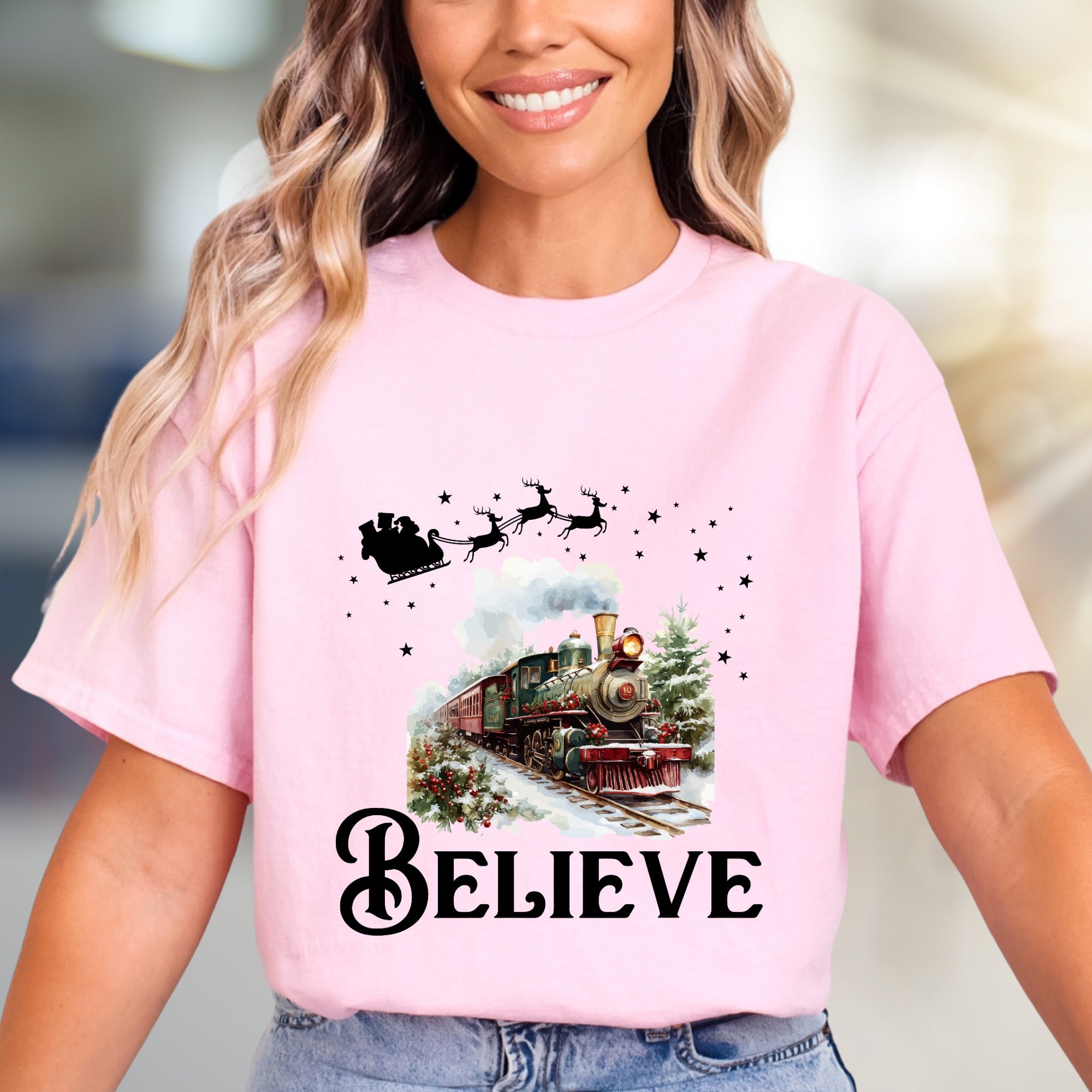 "BELIEVE" Christmas Train Graphic Tee, a Winter Wonderland Pick for Holiday Enthusiasts
