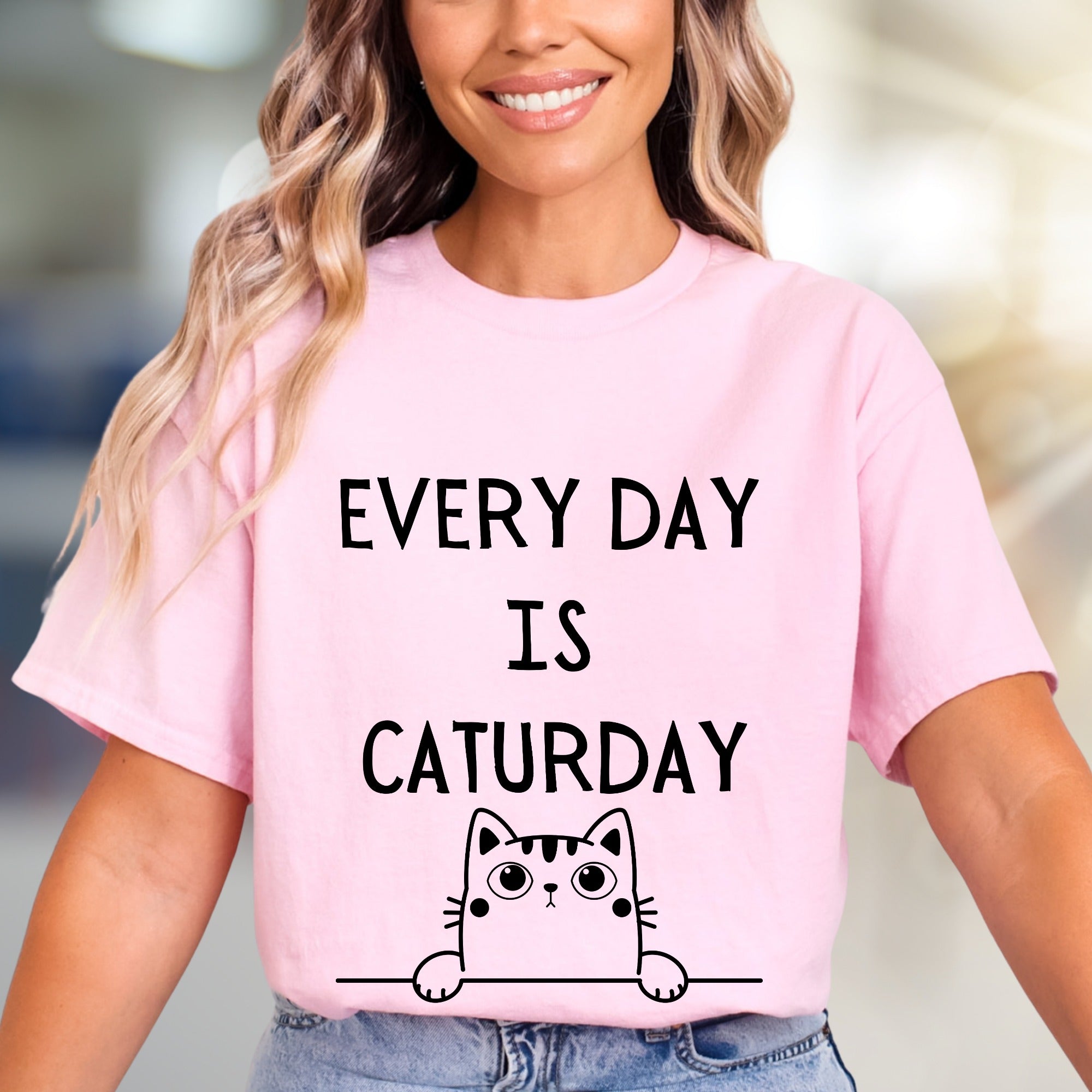 "EVERY DAY IS CATURDAY" Whimsical Cat Graphic Tee, a Feline Fun Pick for Pet Lovers