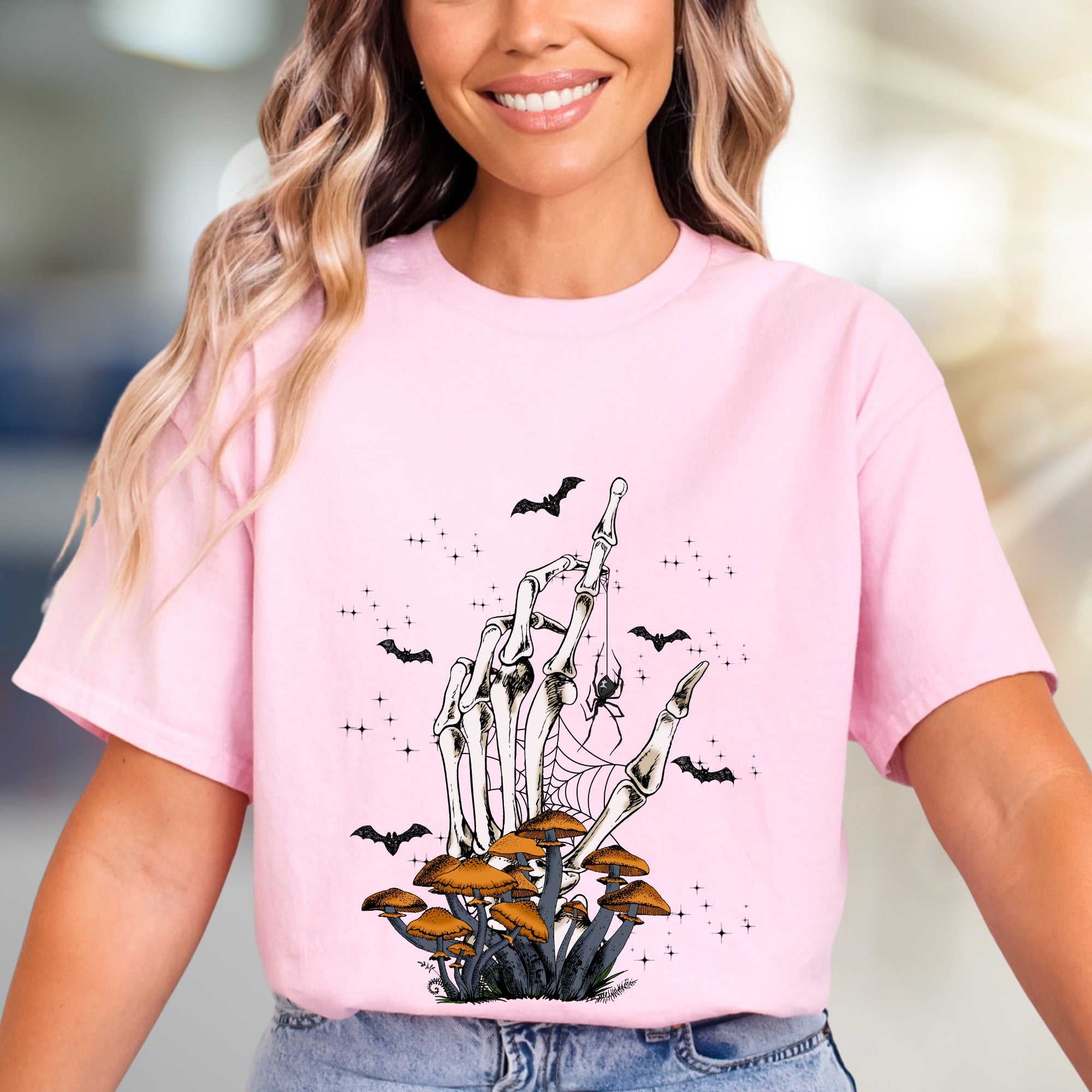 Skeleton Hand Mushroom Graphic Tee, a Spooky-Cute Pick for Halloween Lovers