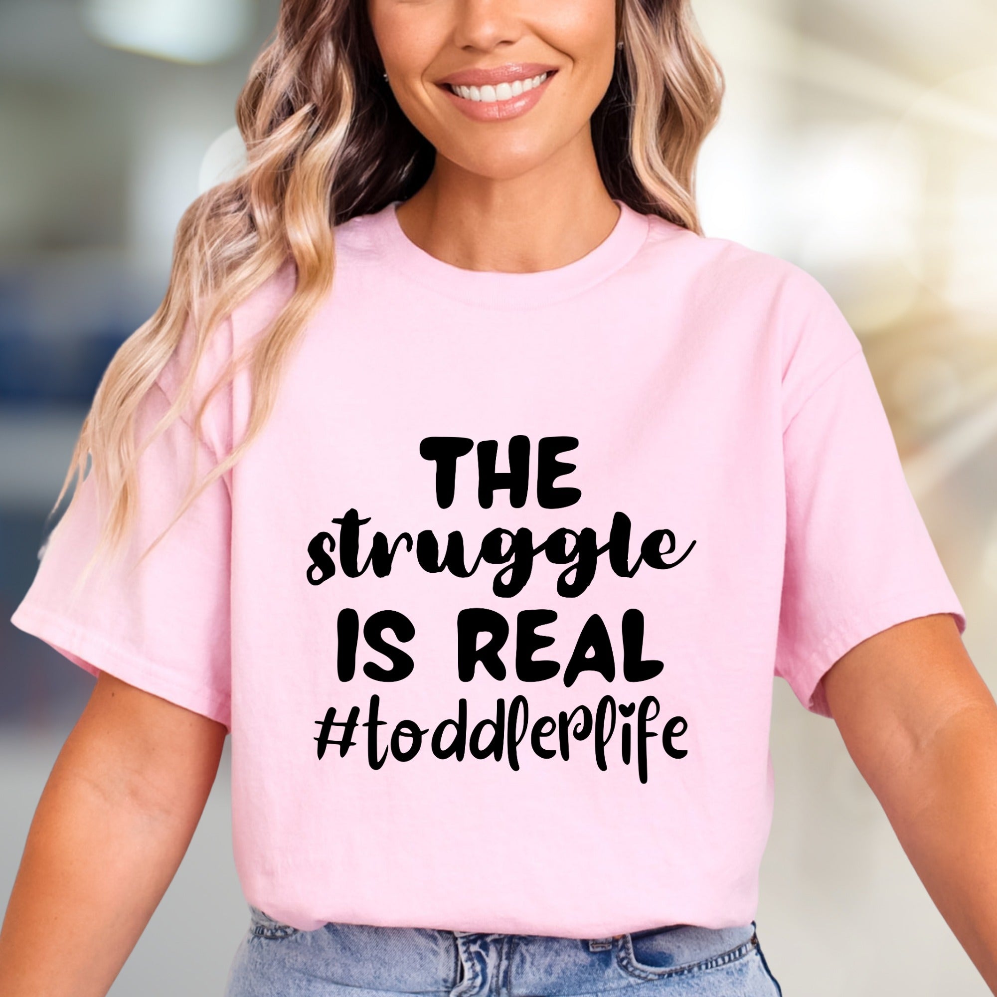 "THE STRUGGLE IS REAL #toddler life" Mom Life Graphic Tee, a Humorous Pick for Parents