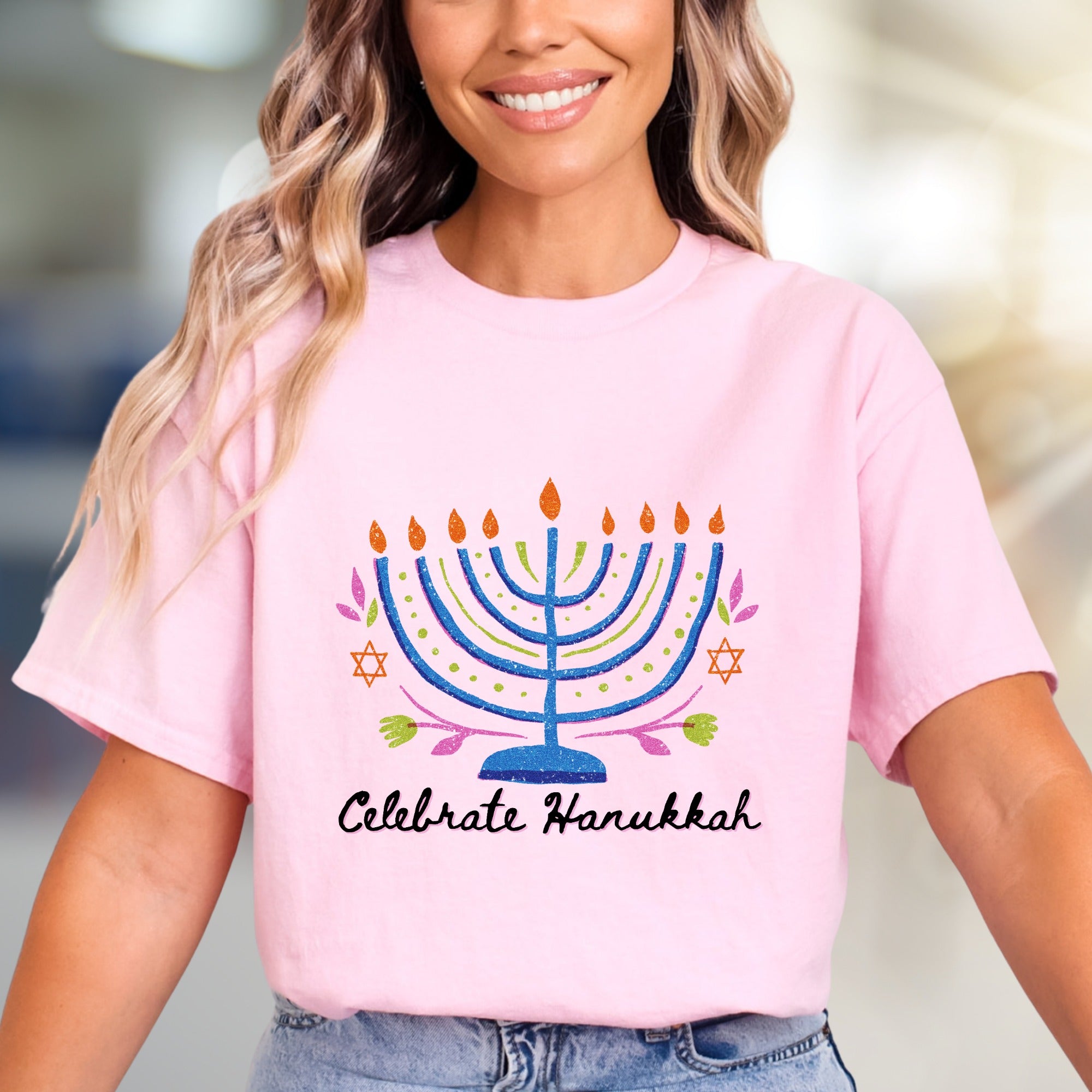 "Celebrate Hanukkah" Vibrant Menorah Graphic Tee, a Festive Holiday Pick for Enthusiasts