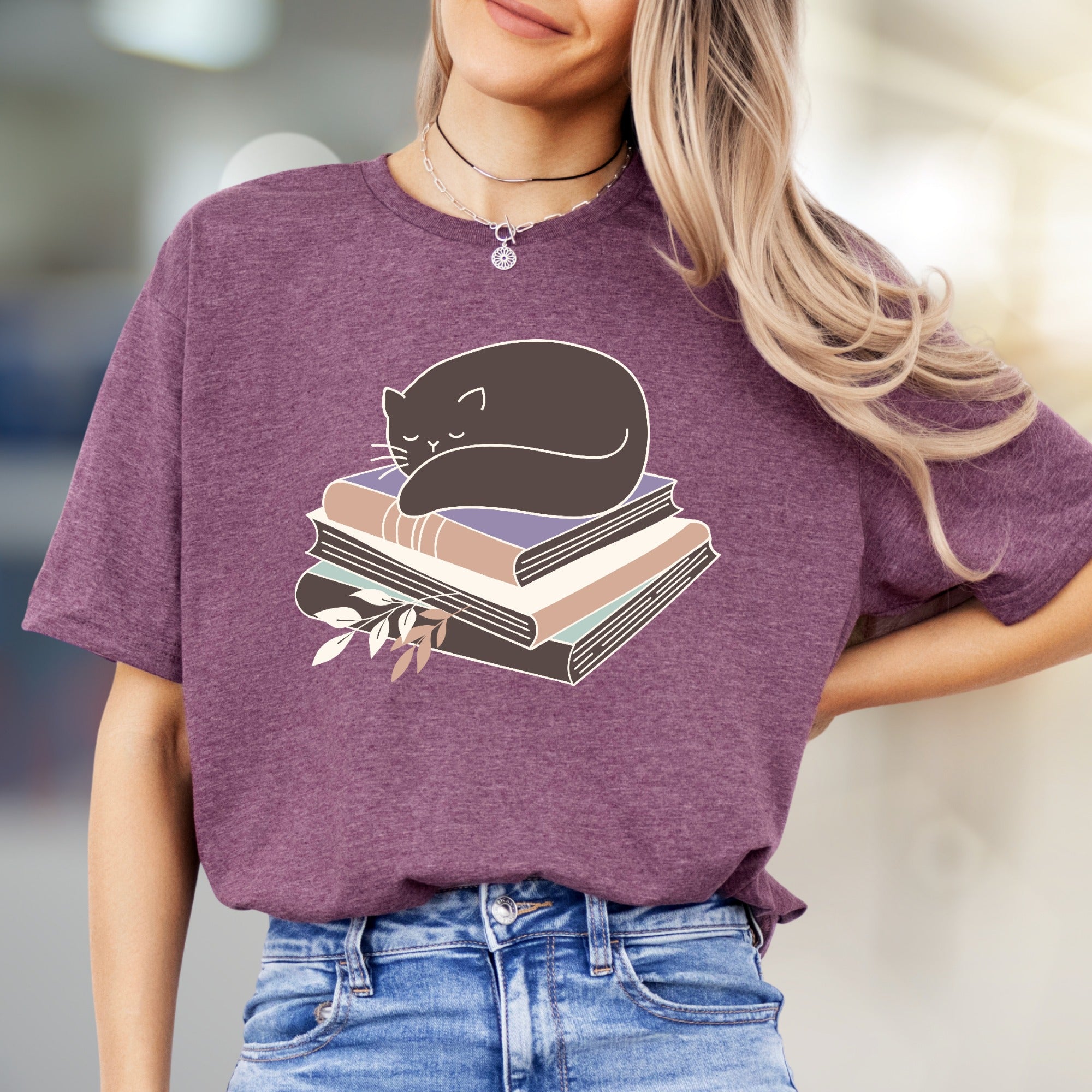 Sleeping Cat on Books Graphic Tee, a Cozy Literary Pick for Book Lovers