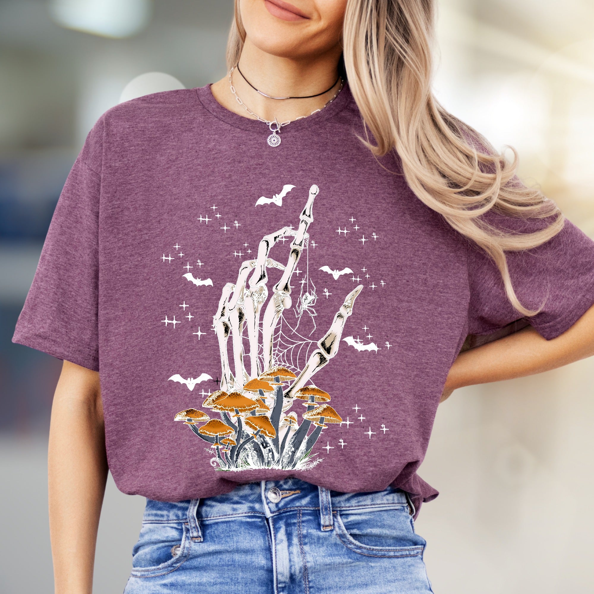 Skeleton Hand Mushroom Graphic Tee, a Spooky-Cute Pick for Halloween Lovers