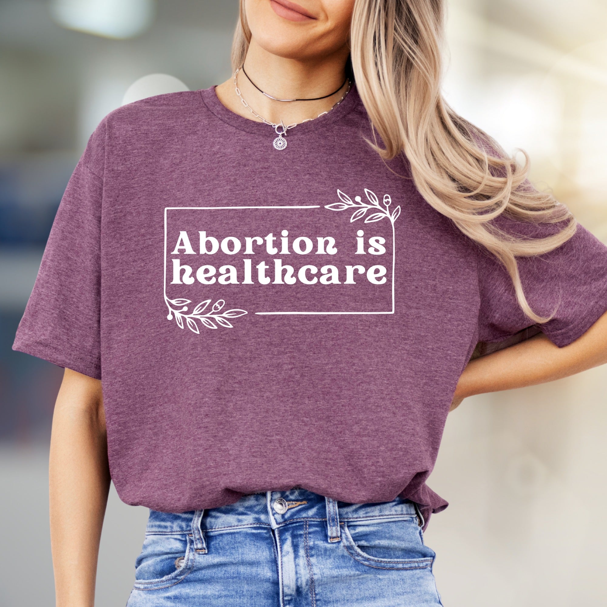 "Abortion is Healthcare" Botanical Frame Graphic Tee, a Statement Unisex Tee for Advocates