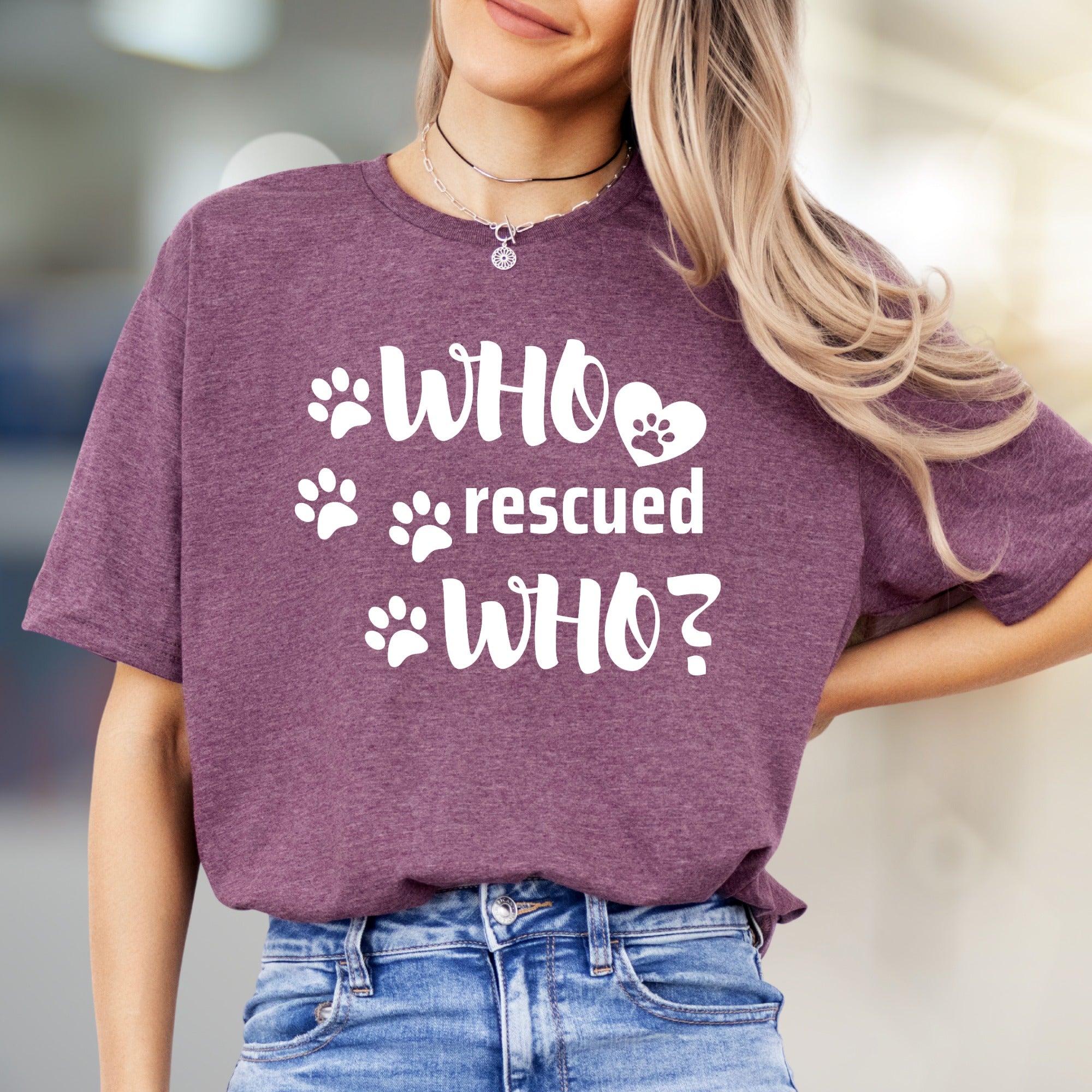 "WHO rescued WHO?" Paw Print Graphic Tee, a Heartfelt Pick for Pet Lovers
