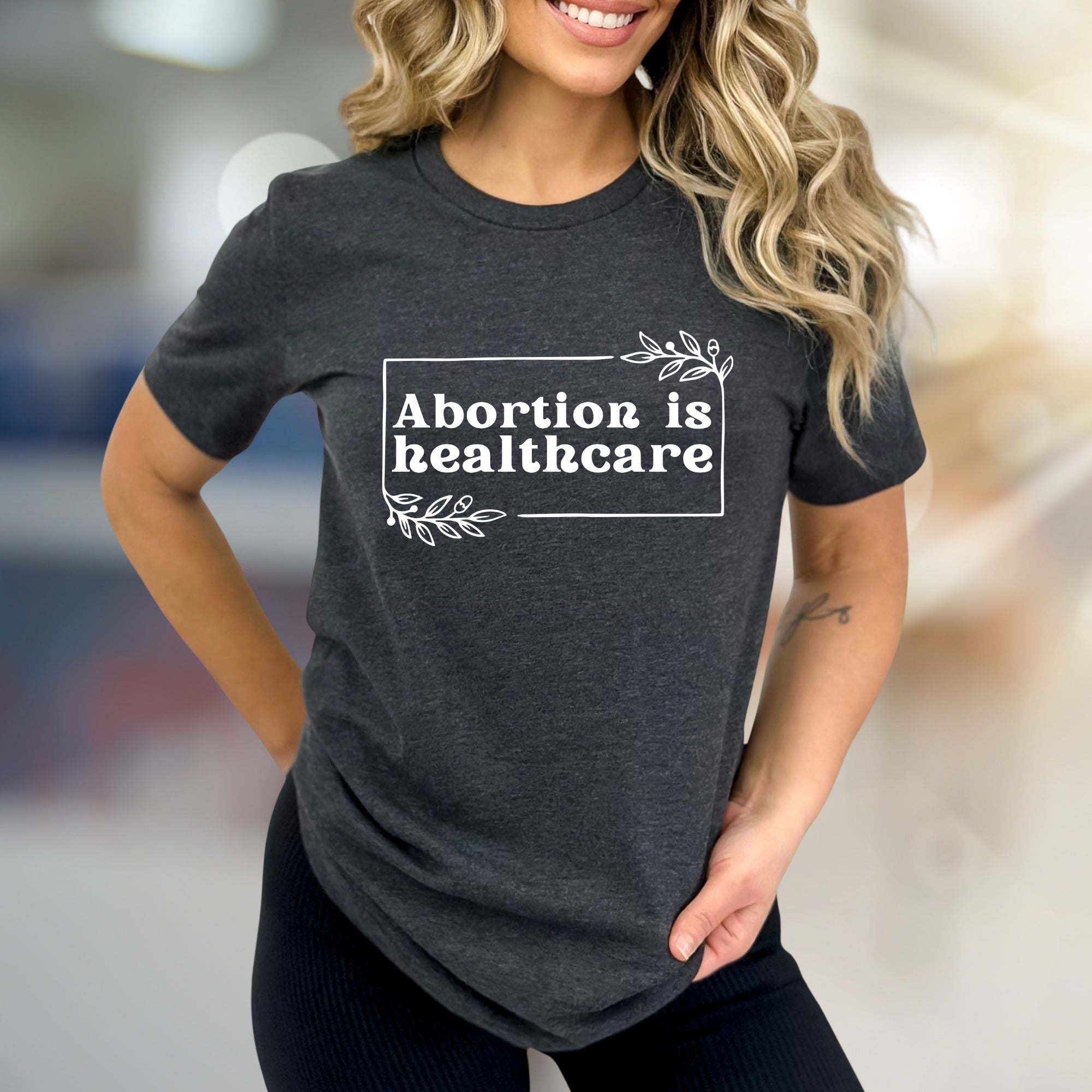 "Abortion is Healthcare" Botanical Frame Graphic Tee, a Statement Unisex Tee for Advocates