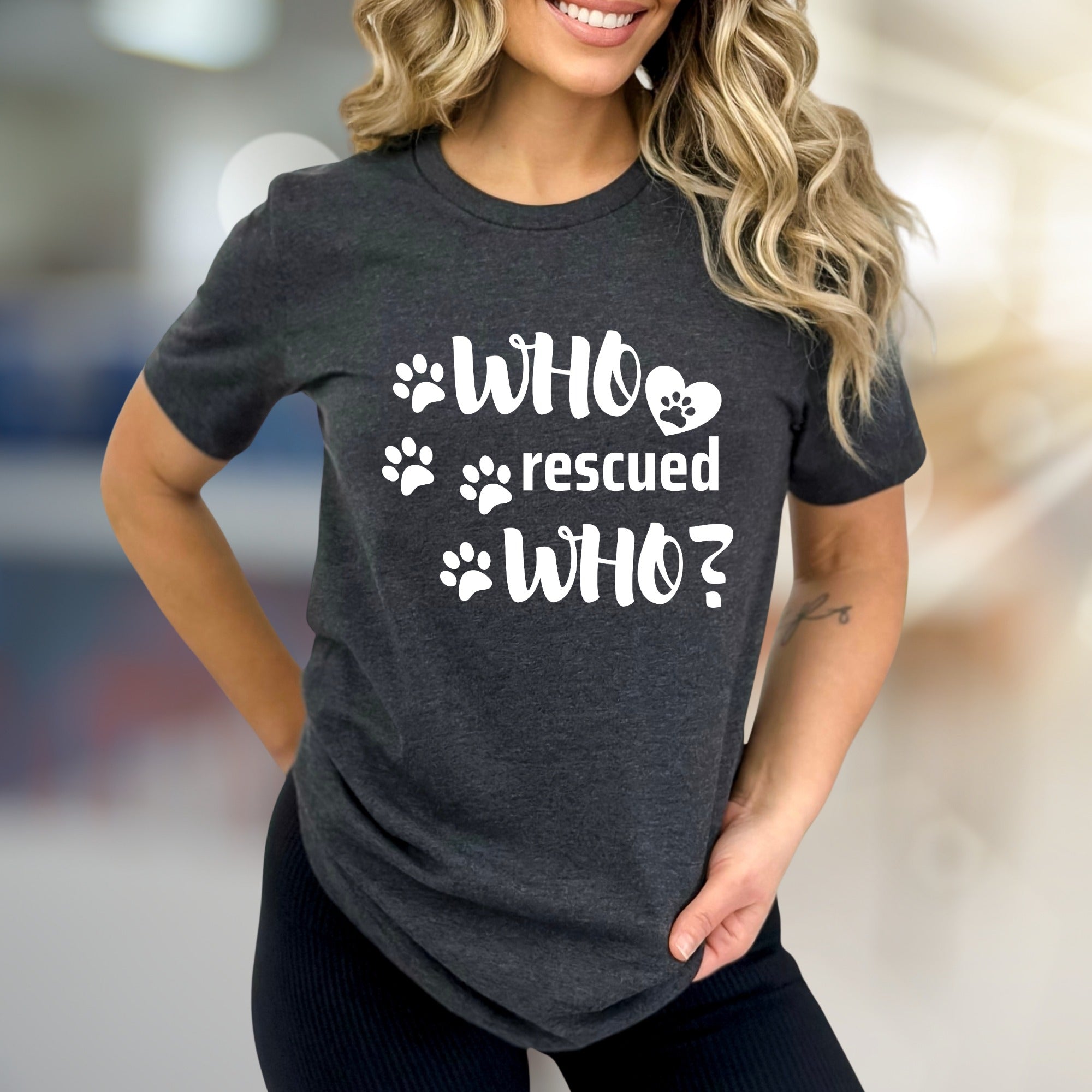 "WHO rescued WHO?" Paw Print Graphic Tee, a Heartfelt Pick for Pet Lovers